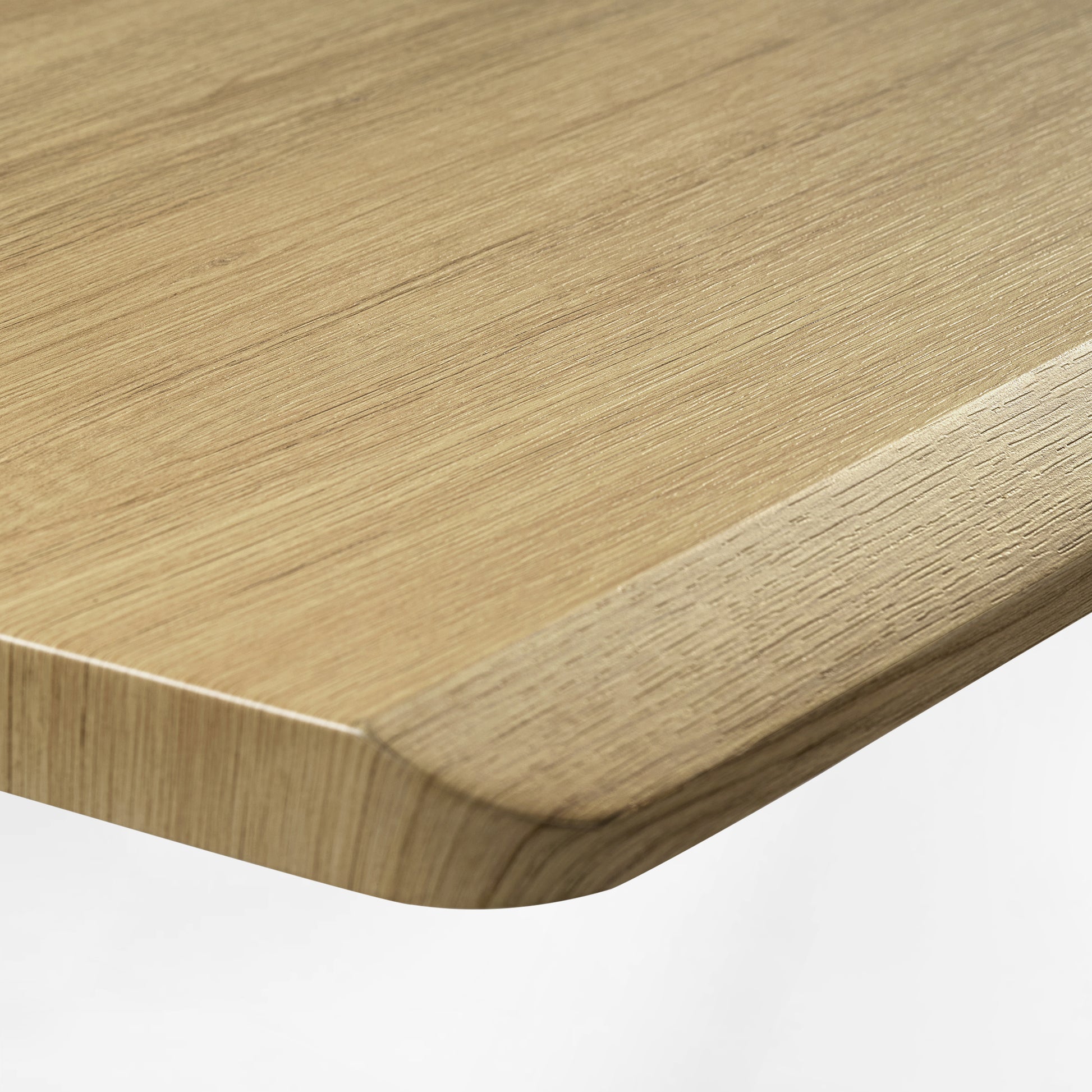 Ark Lite Standing Desk Detail, Light Woodgrain Finish With Rounded Edge, Durable Surface.