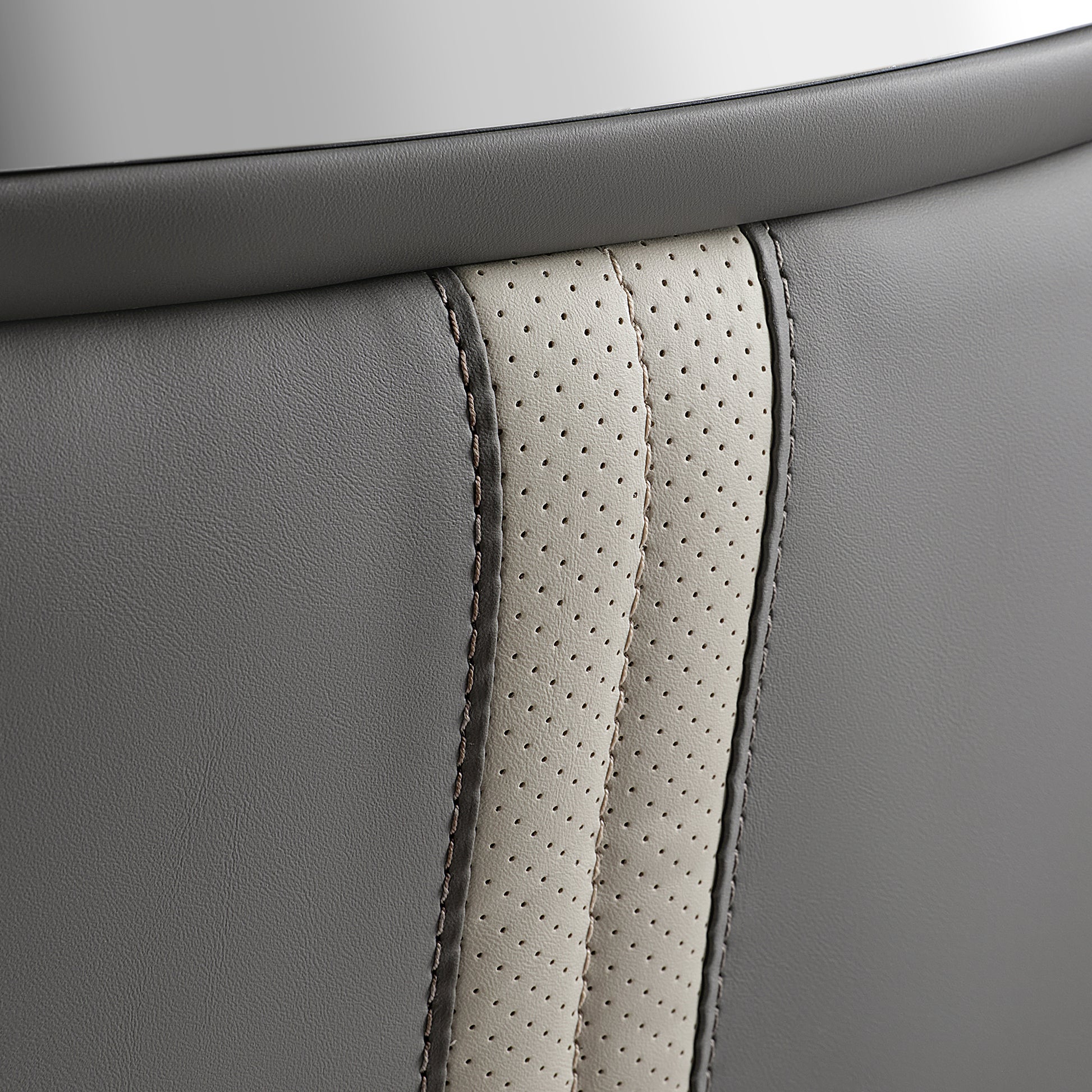 Close-Up of Royal II Office Chair Back Detail, Cream and Gray Leather With Ergonomic Design.