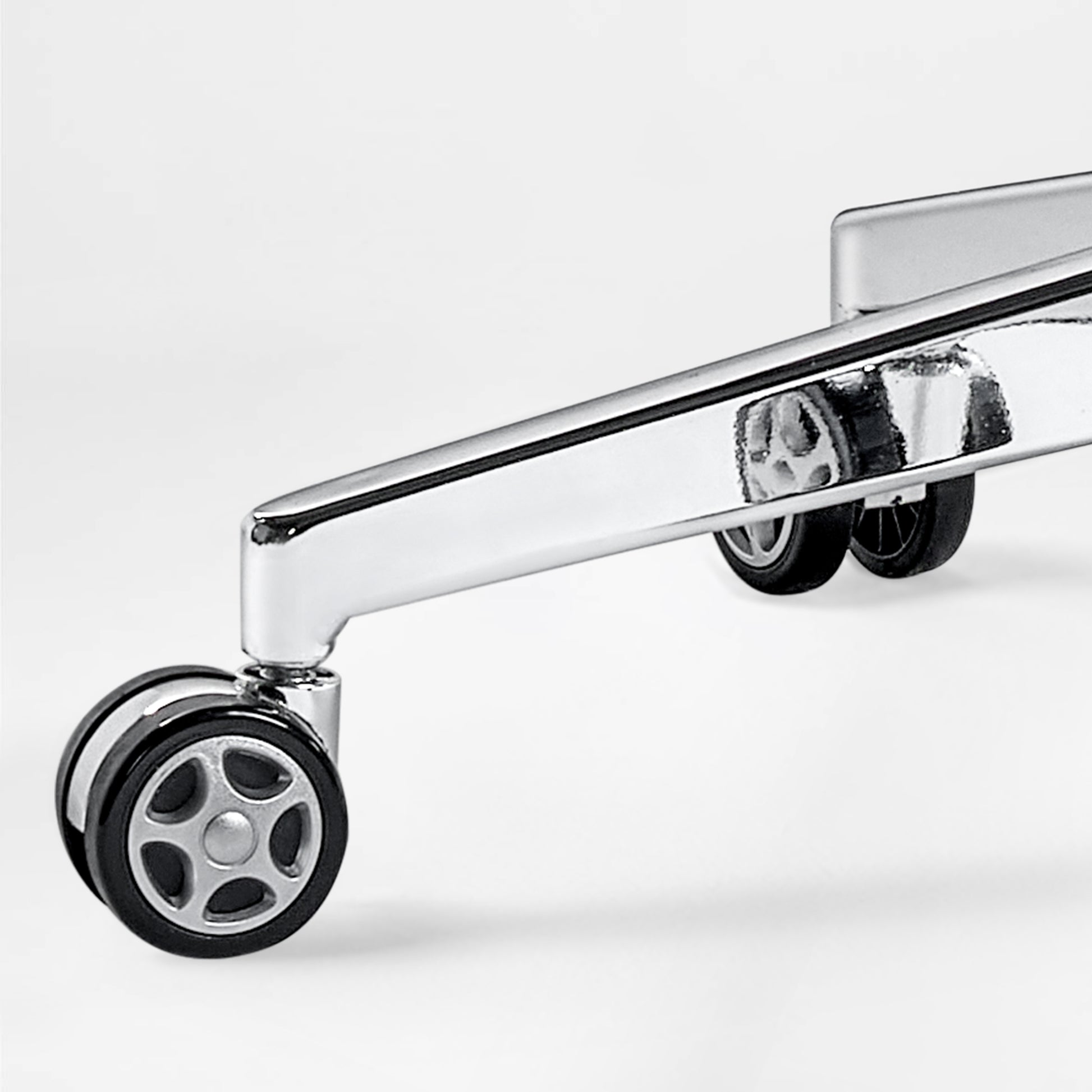 Eureka Ergonomic Royal Renee executive chair polished chrome base with dual-wheel casters for mobility.