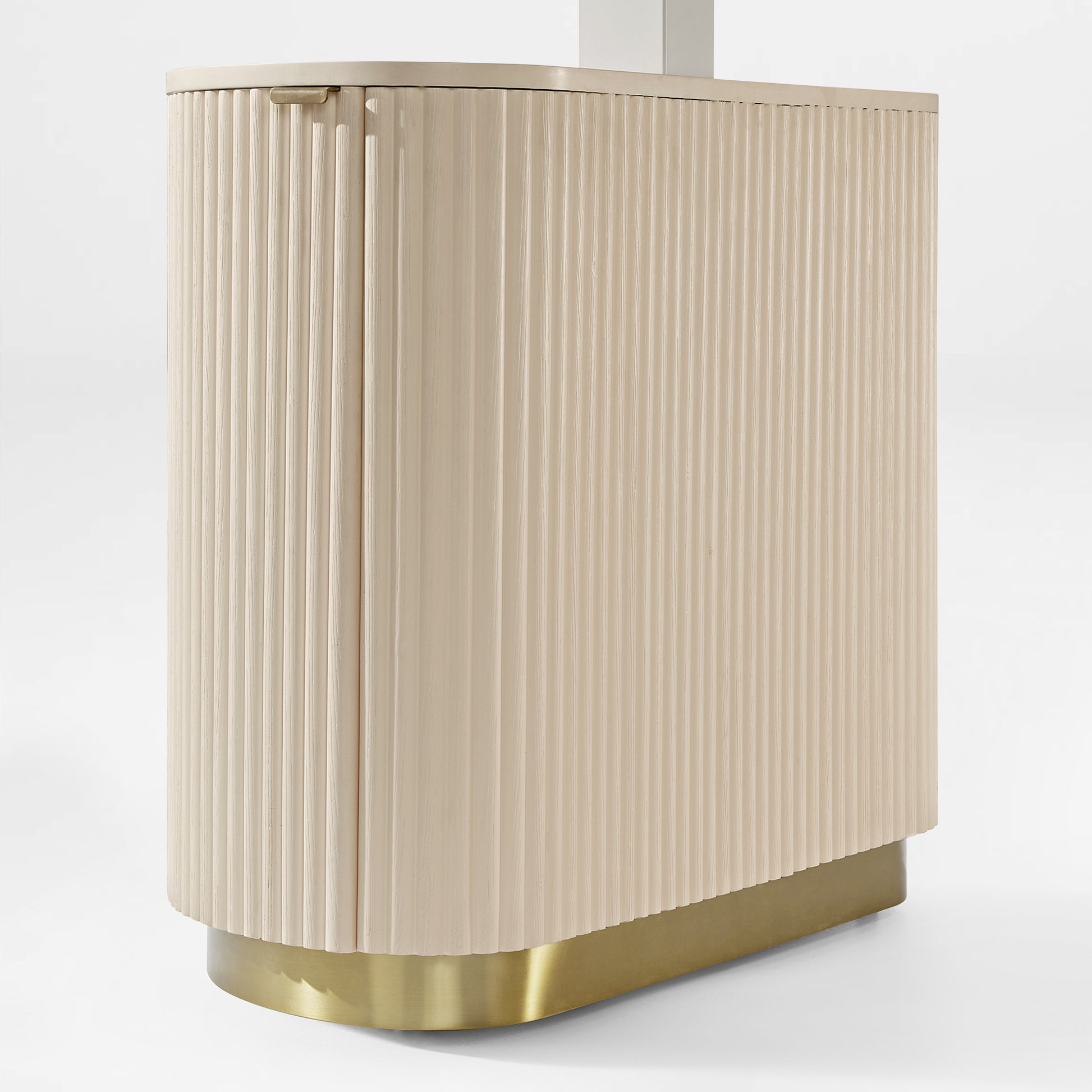 Opal Oval Executive Standing Desk Cabinet Detail. Light Beige Ribbed Panels, Brass Base. Modern Ergonomic Design.