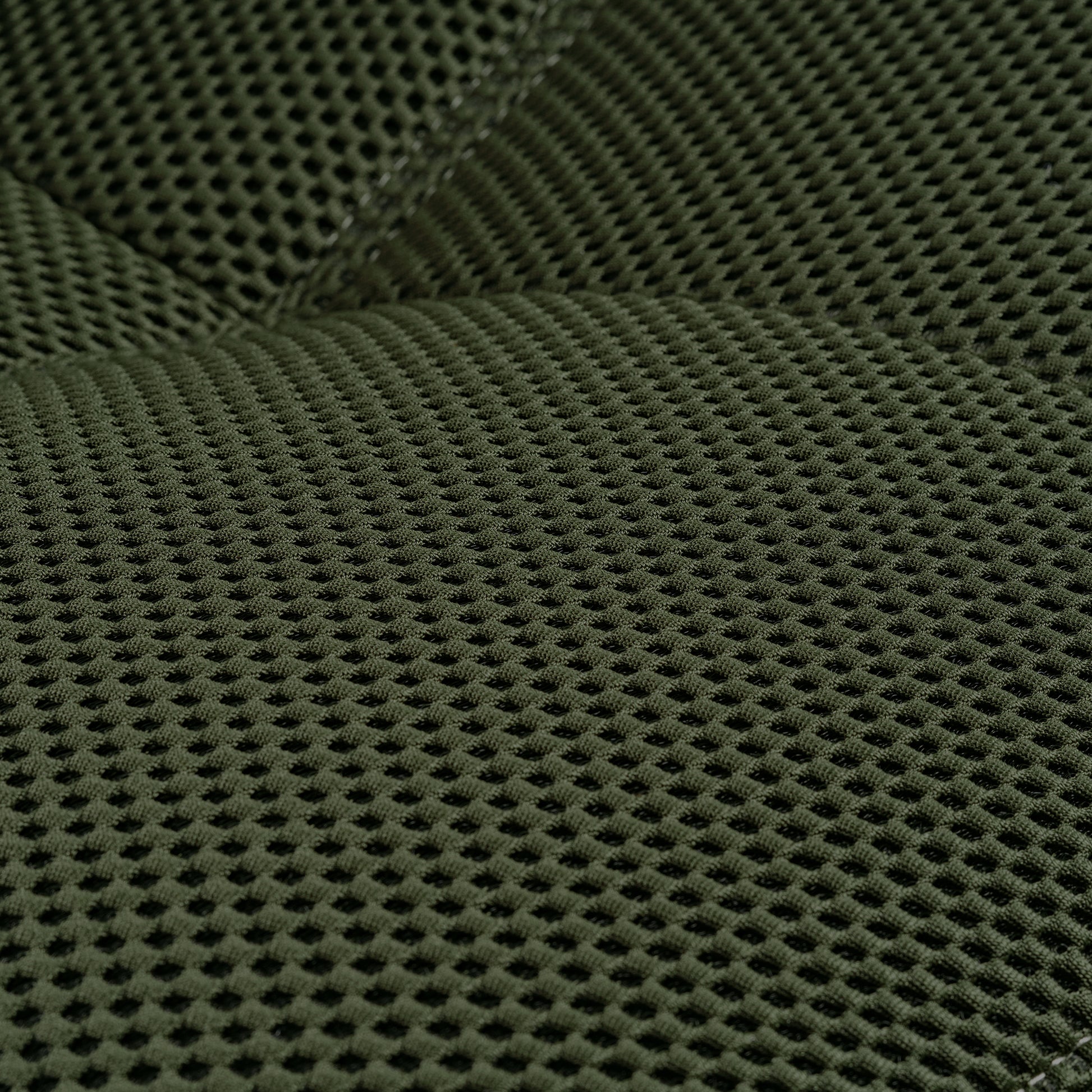 Detail of Green Techno 3D Fabric On Linx Power Glider Recliner Backrest, Breathable and Ergonomic Design.