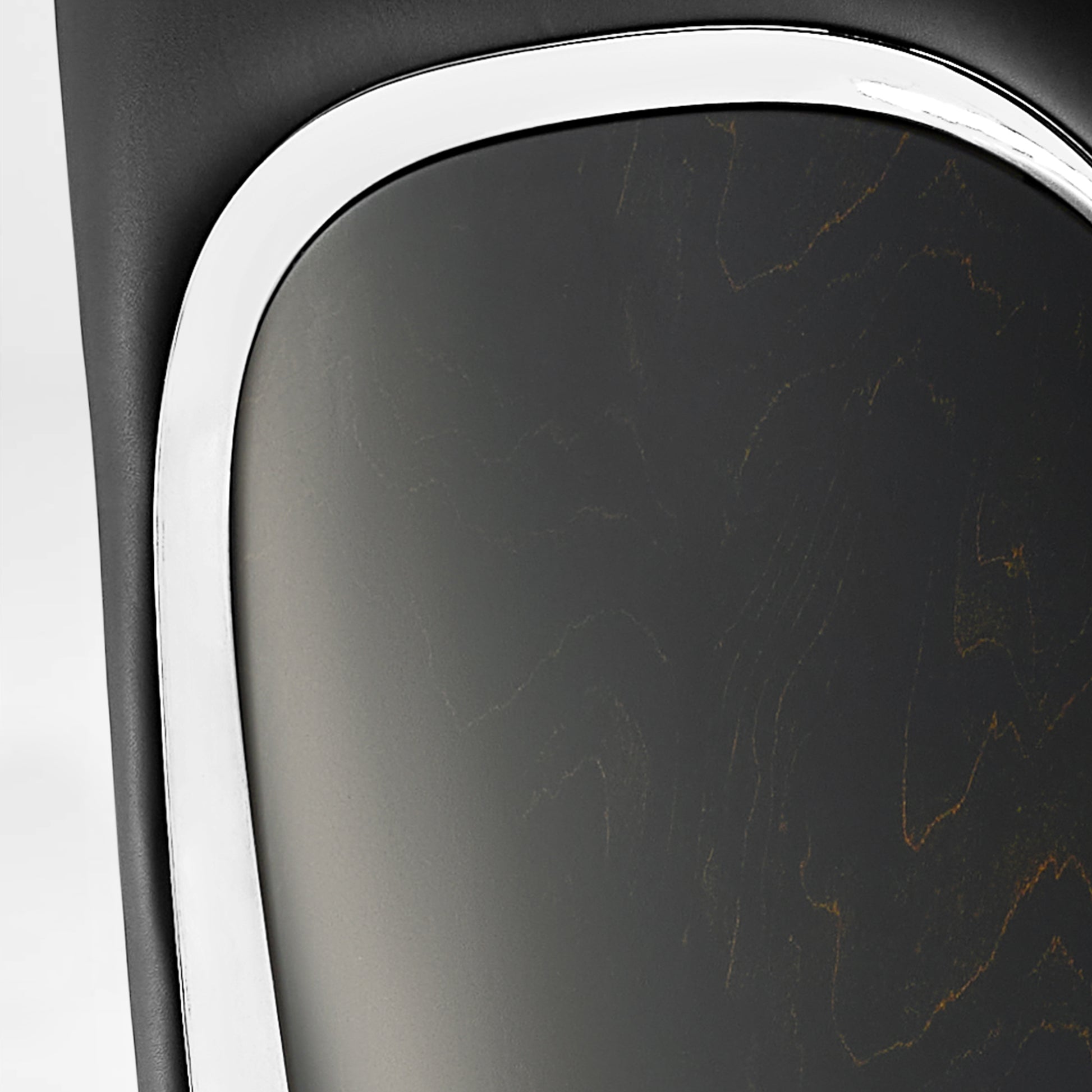 Eureka Ergonomic Serene Ella dark gray Napa leather executive chair detail with chrome accent and wood grain panel.