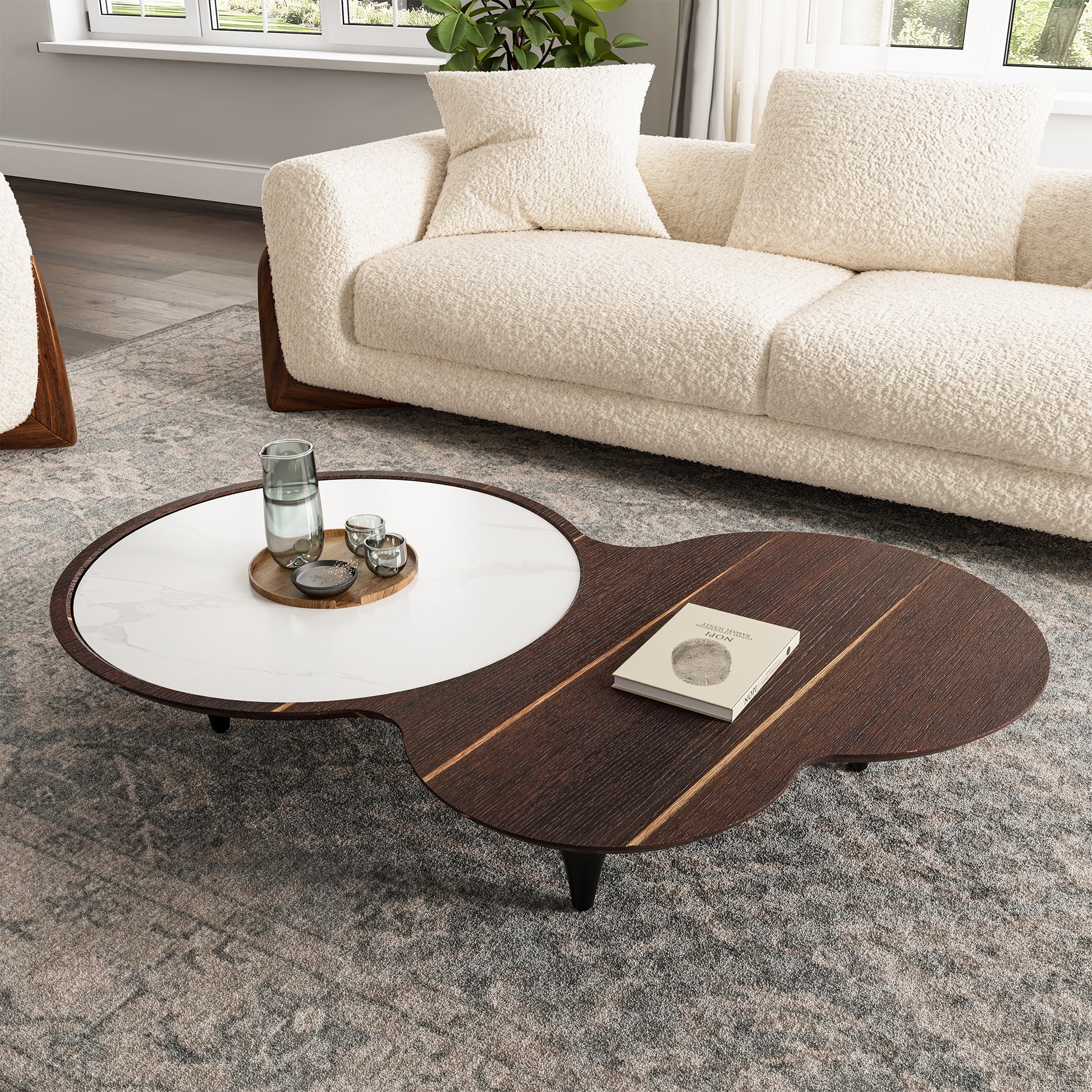 55 Modern Irregular Walnut Coffee Table in a Living Room Setting With White Marble Top, Walnut Finish, and Sofa.