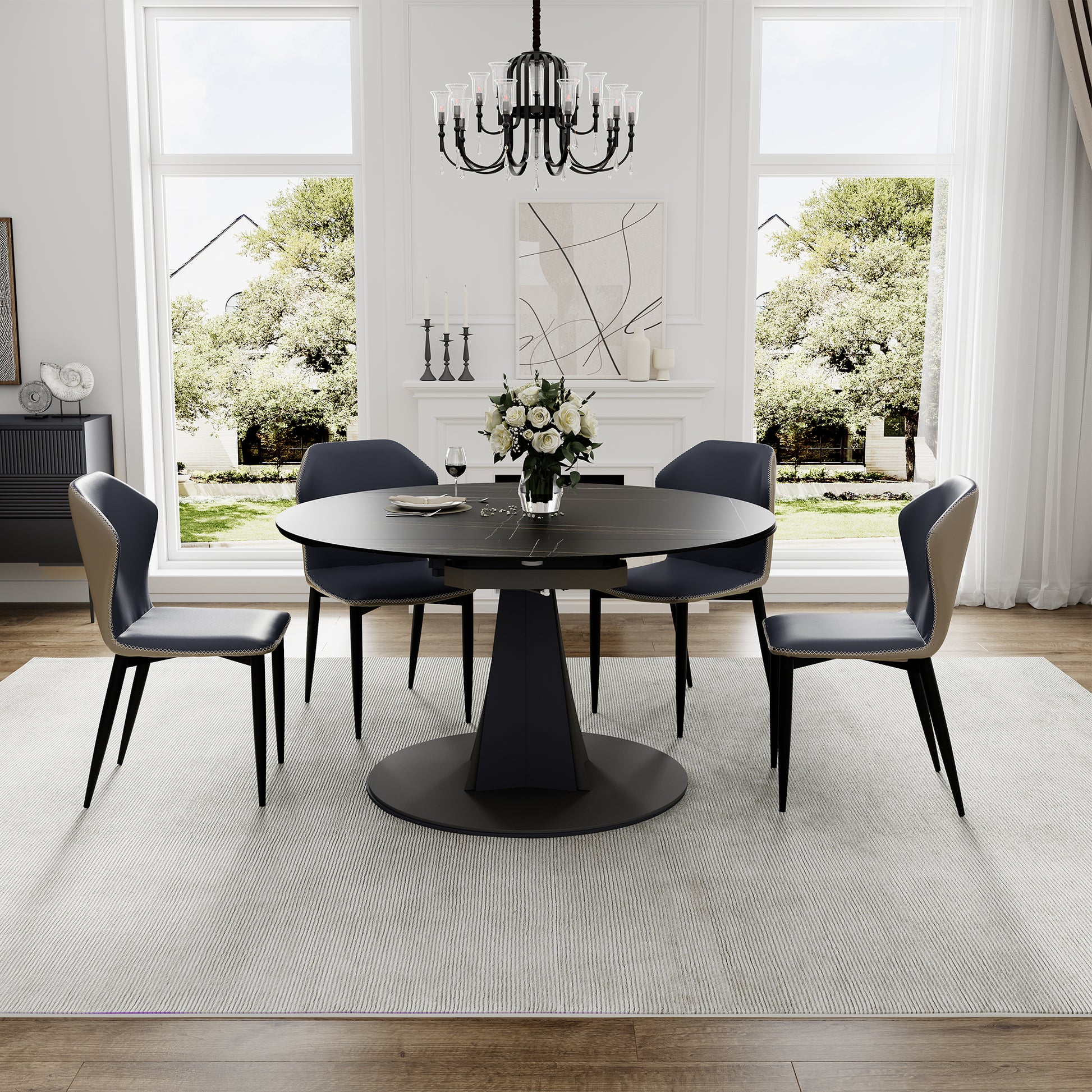 Amelia Round Extending Dining Table With Grey Chairs, Creating an Elegant Dining Setting.