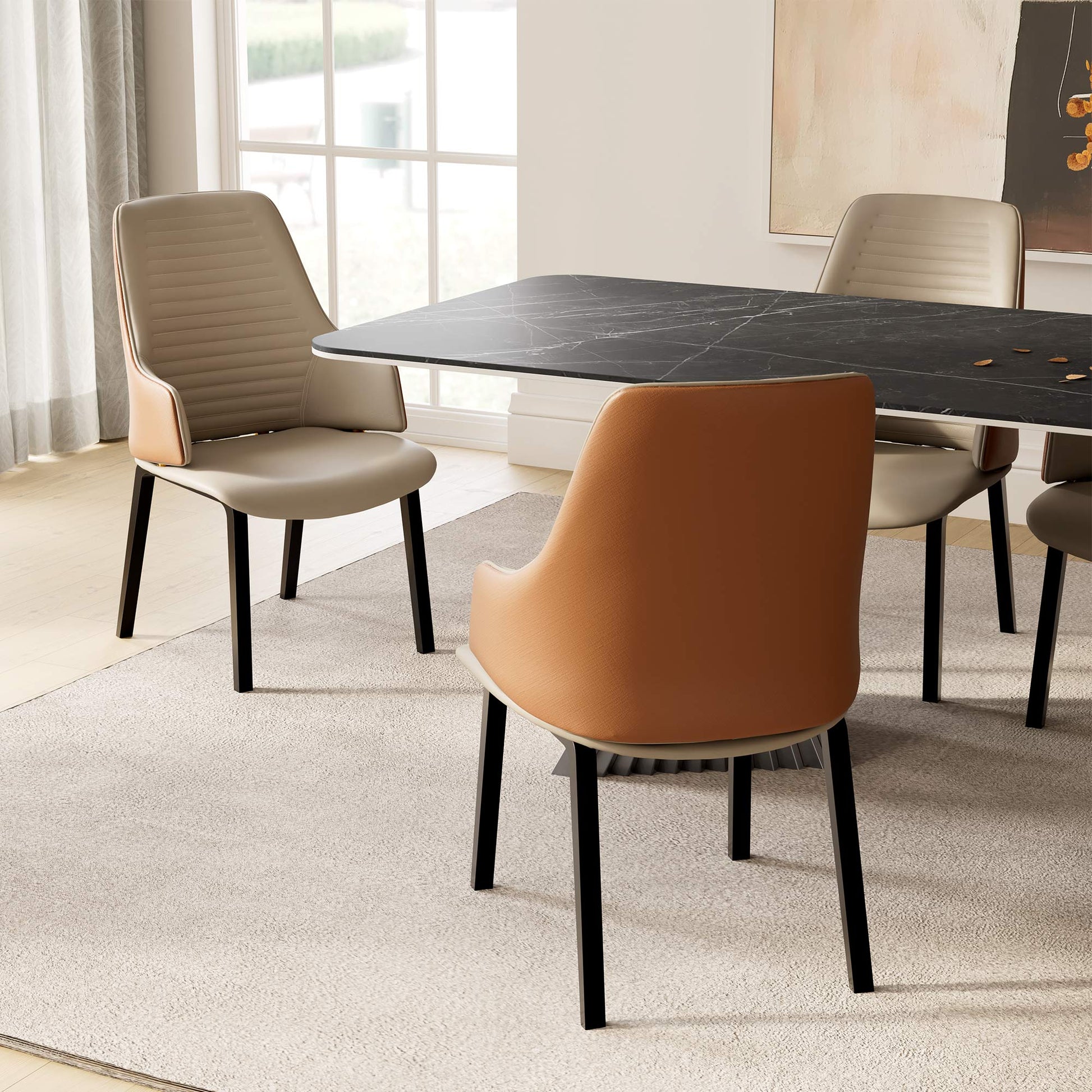 Juliet Dining Arm Chairs Set of 2, With Brown and Beige Upholstery, Black Legs, Around the Dark Marble Dining Table.