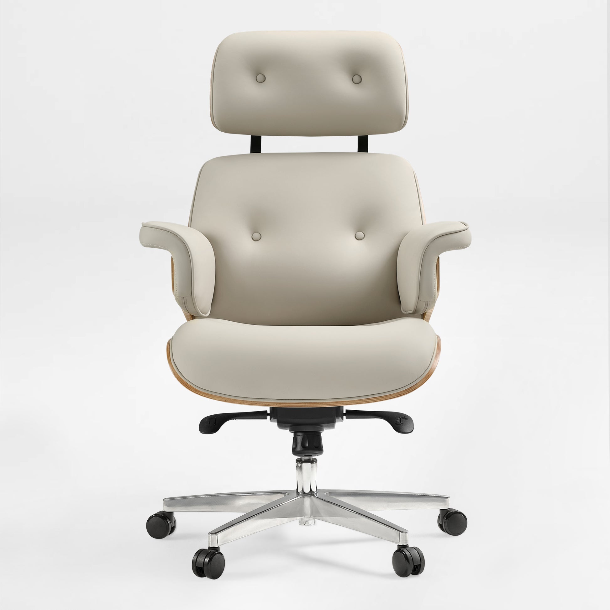 Eureka Ergonomic Mathias light beige Napa leather executive chair with button-tufted headrest and seat, wood veneer accents, silver base.