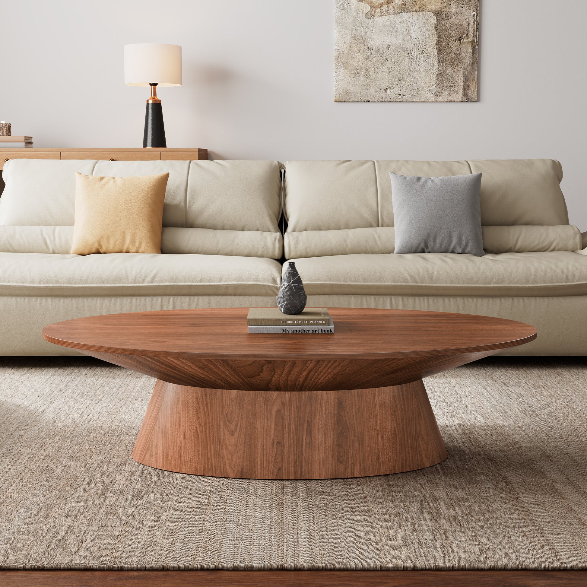 51 Walnut Oval Coffee Table in a Modern Living Room Setting With a Curved Base, Walnut Veneer, Ideal for Art and Leisure.