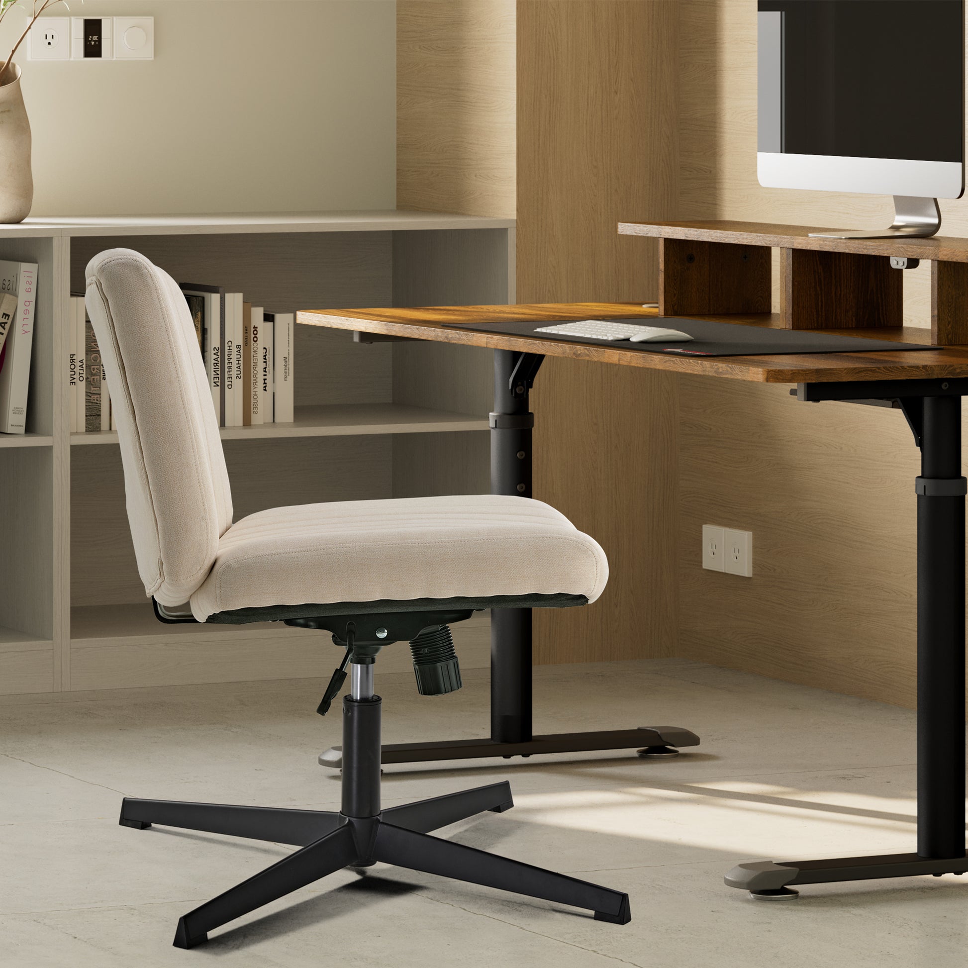 Adena Swivel Lounge & Office Chair, Cream Linen-Blend Fabric, Ergonomic Design, Black Base, Next to a Wooden Desk.