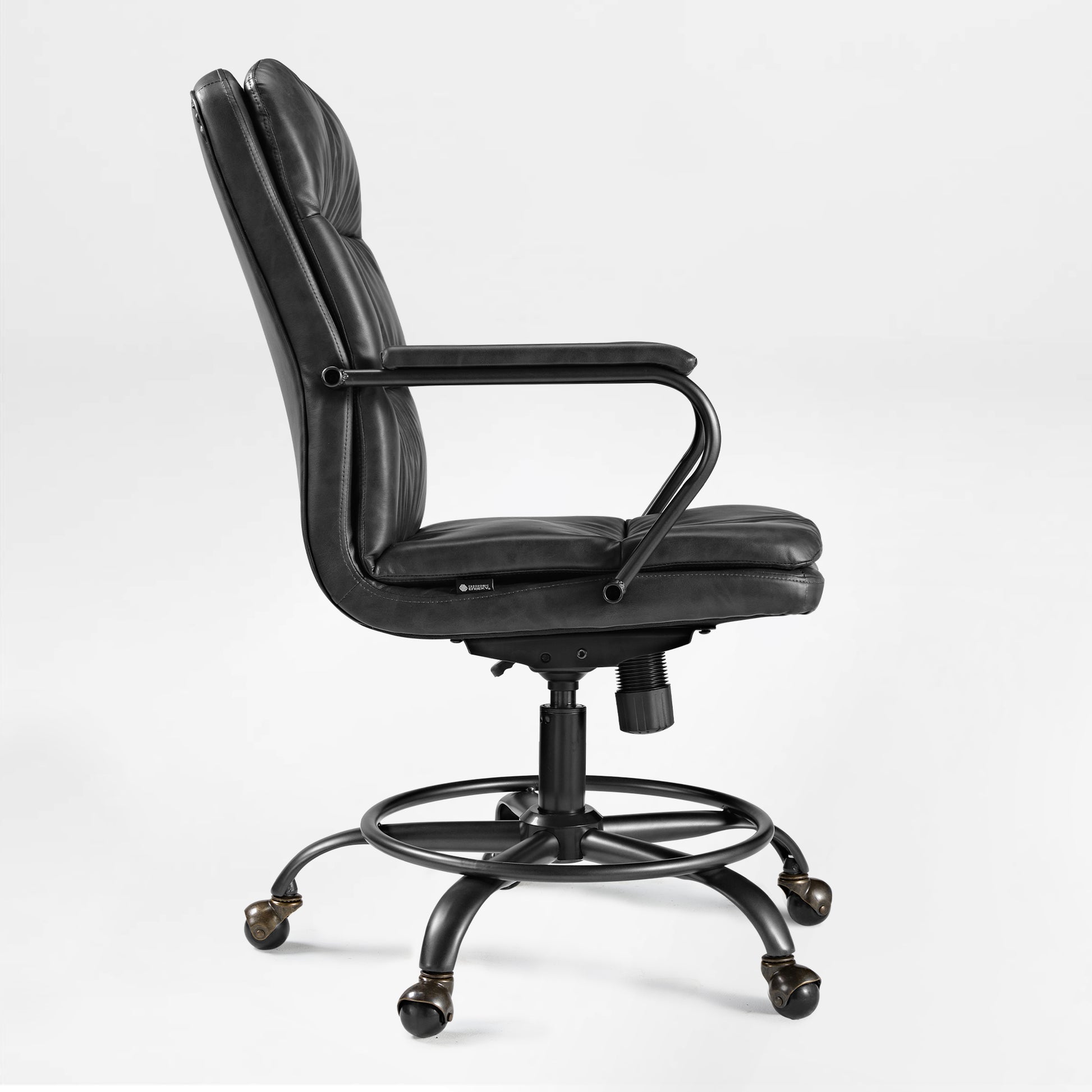 Regal Pu Leather Home Office Chair, Black Ergonomic Design With Bronze Accents.