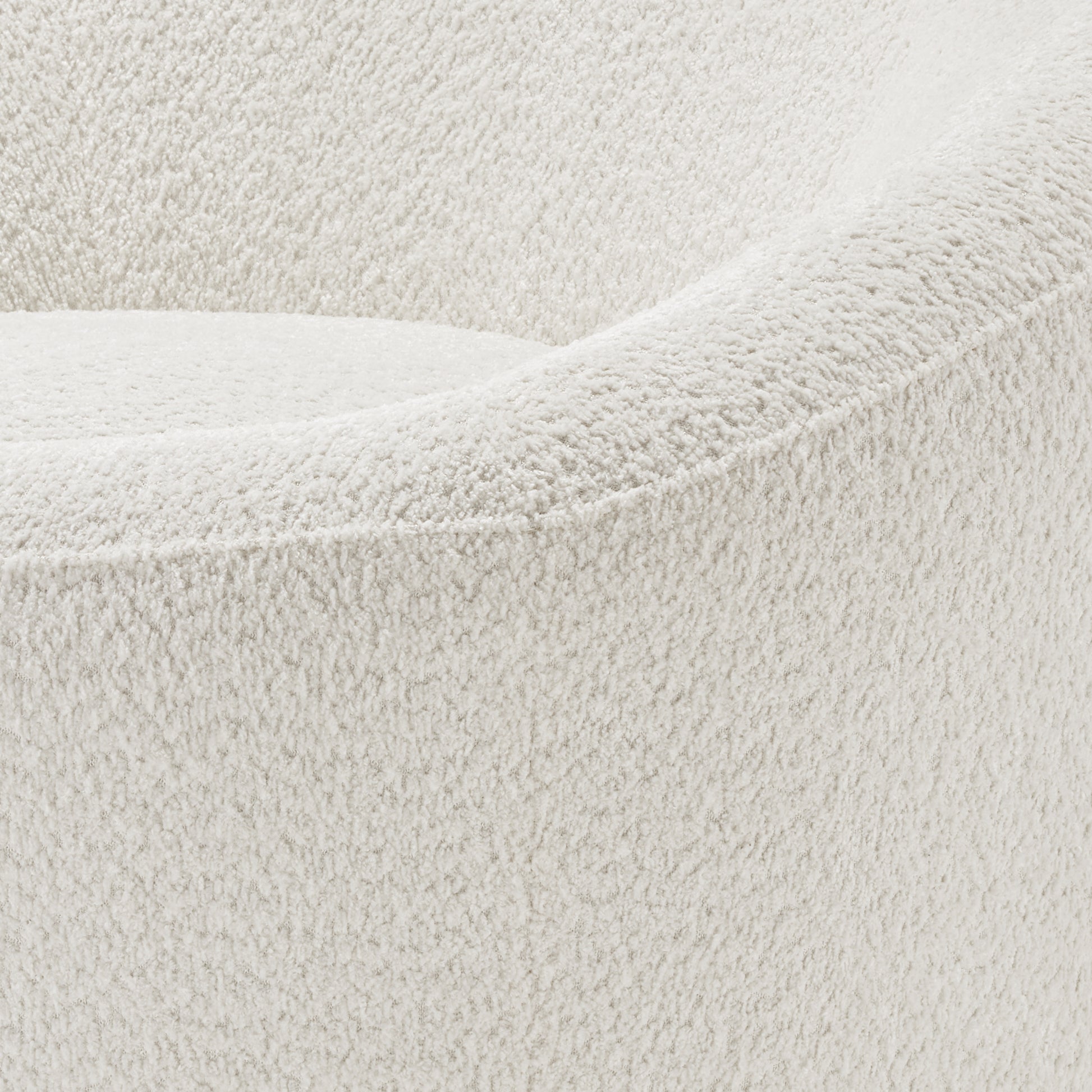 White Boucle Fabric Detail of Elison Swivel Accent Chair, Highlighting Texture and Design.