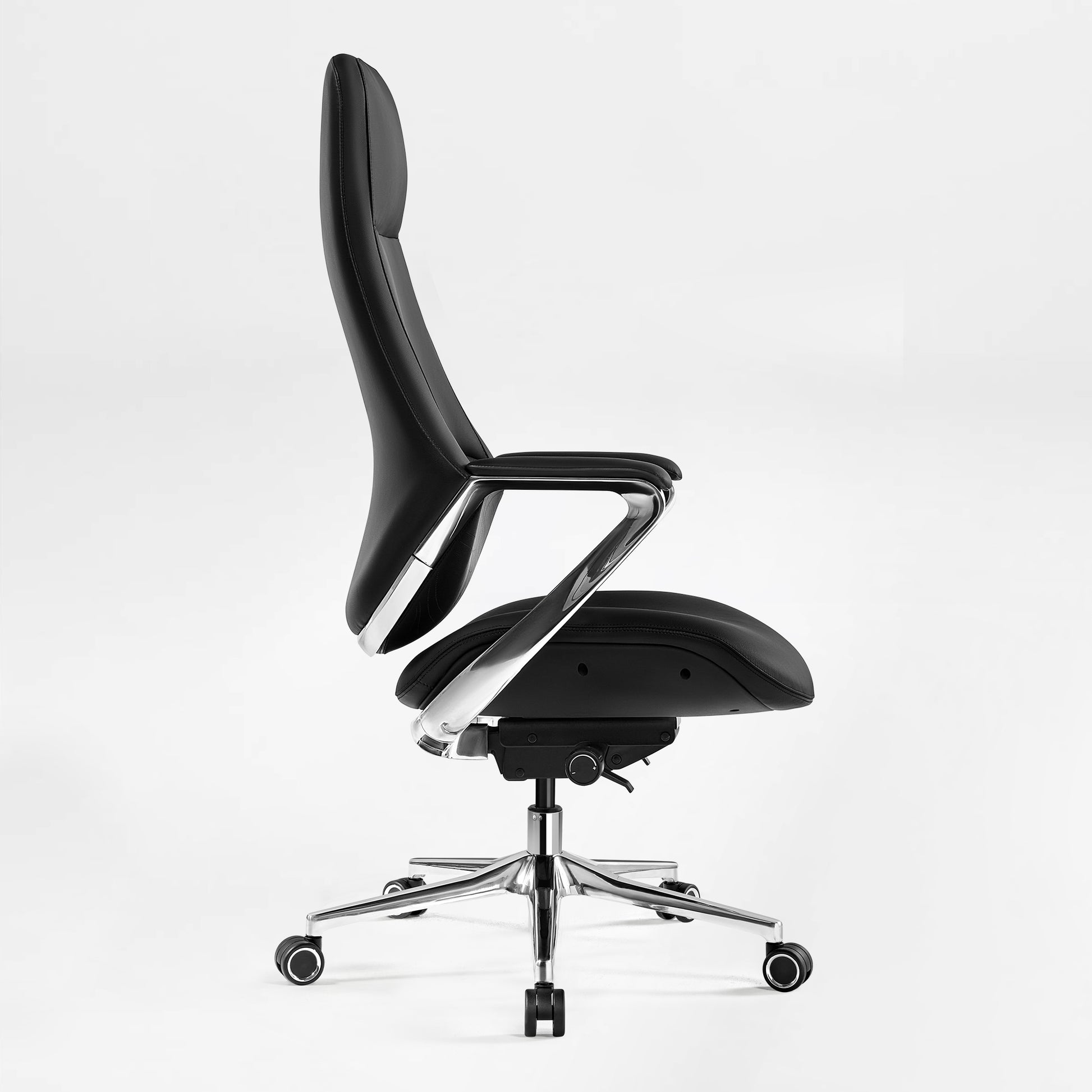 Eureka Ergonomic Nox black genuine leather executive chair side profile with chrome armrests and high back on a five-star base.