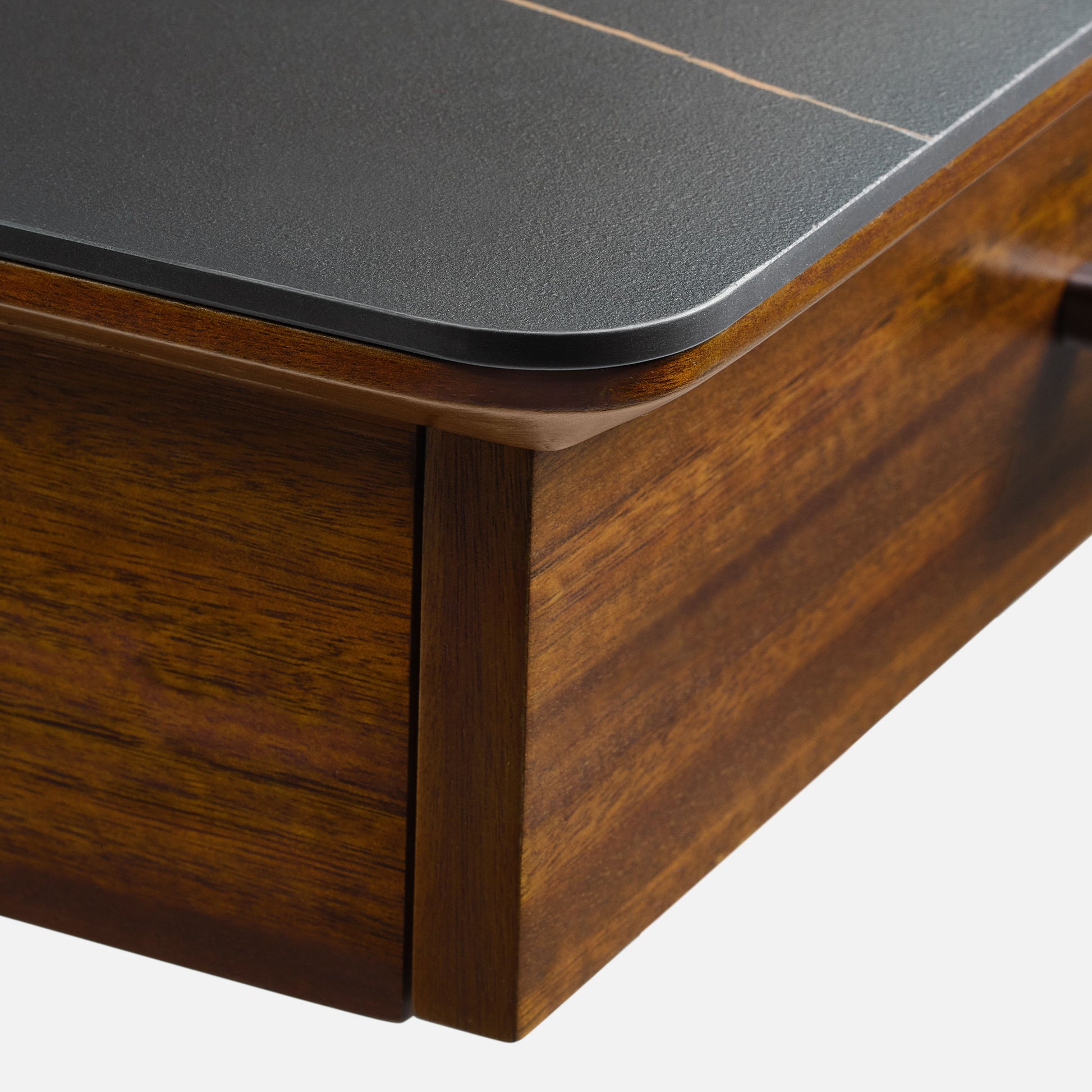 Eureka Ergonomic Ark Pro Desk Detail: Black Sintered Stone and Wood Grain Accent.