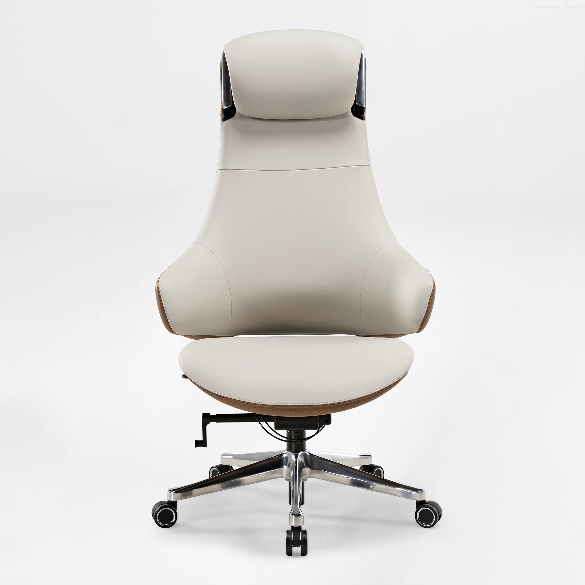 Eureka Ergonomic Serene Ella executive chair in dual-tone cream and tan Napa leather with chrome accents and wheeled base.