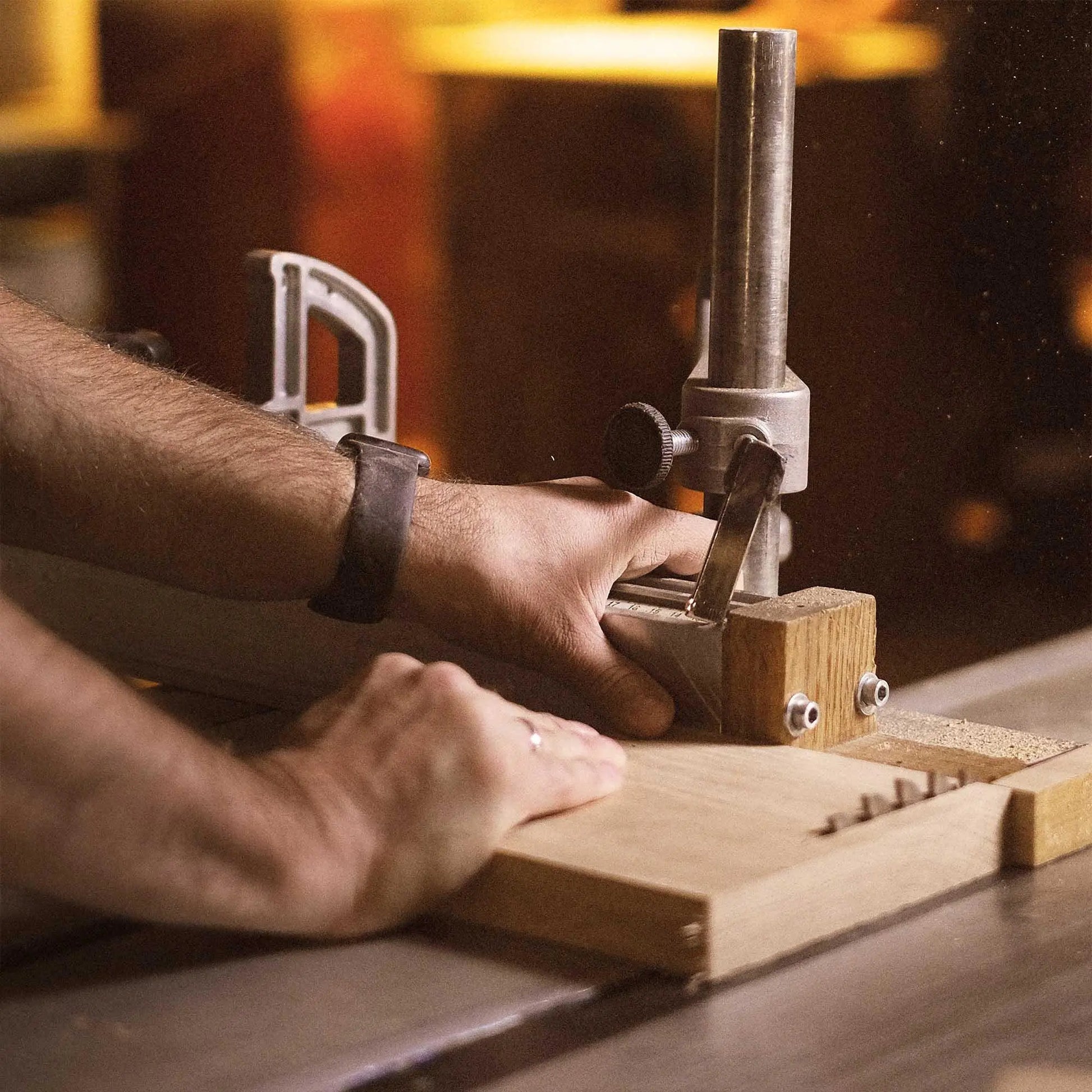 Craftsman Cutting Wood On a Woodworking Machine. Precision Craftsmanship, Desk Construction Detail.