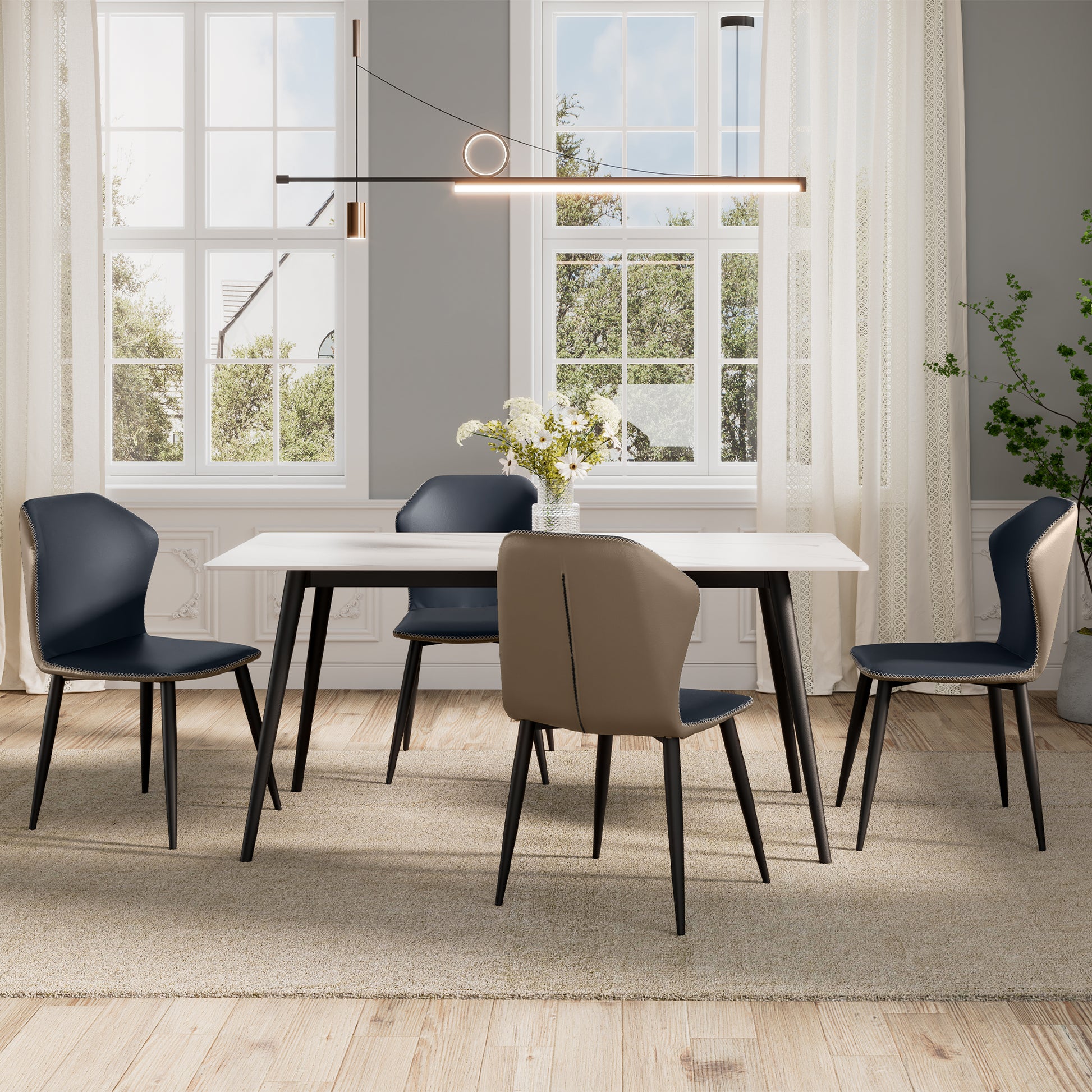 Elysian Blue Dining Chairs Set Around a Modern Dining Table in a Well-Lit Room.