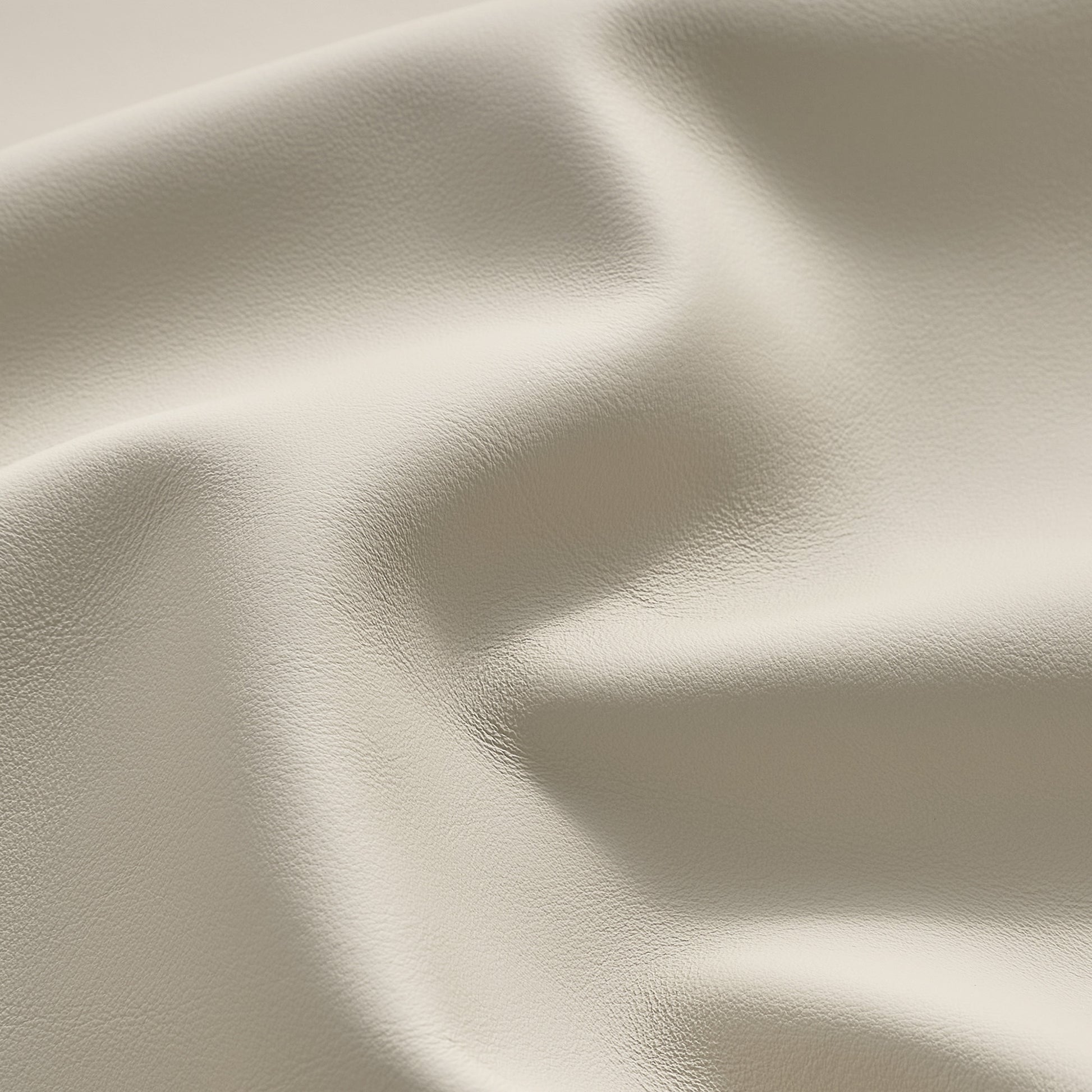 Eureka Ergonomic Cream Napa leather texture detail for Serene executive office chair, showcasing fine grain.