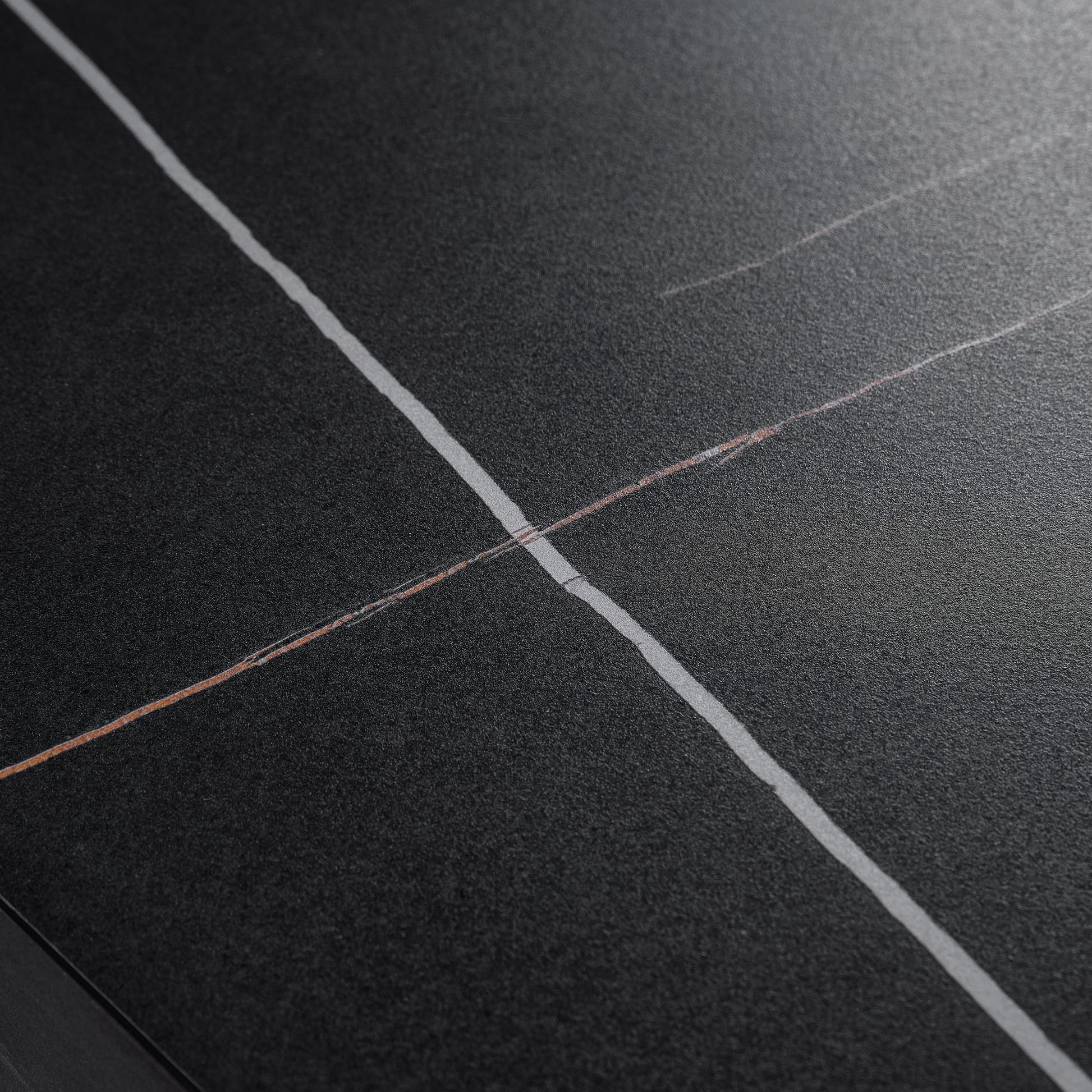 Eureka Ergonomic Zen Pro Executive Desk Detail, Black Sintered Stone Top With White and Gold Veining.