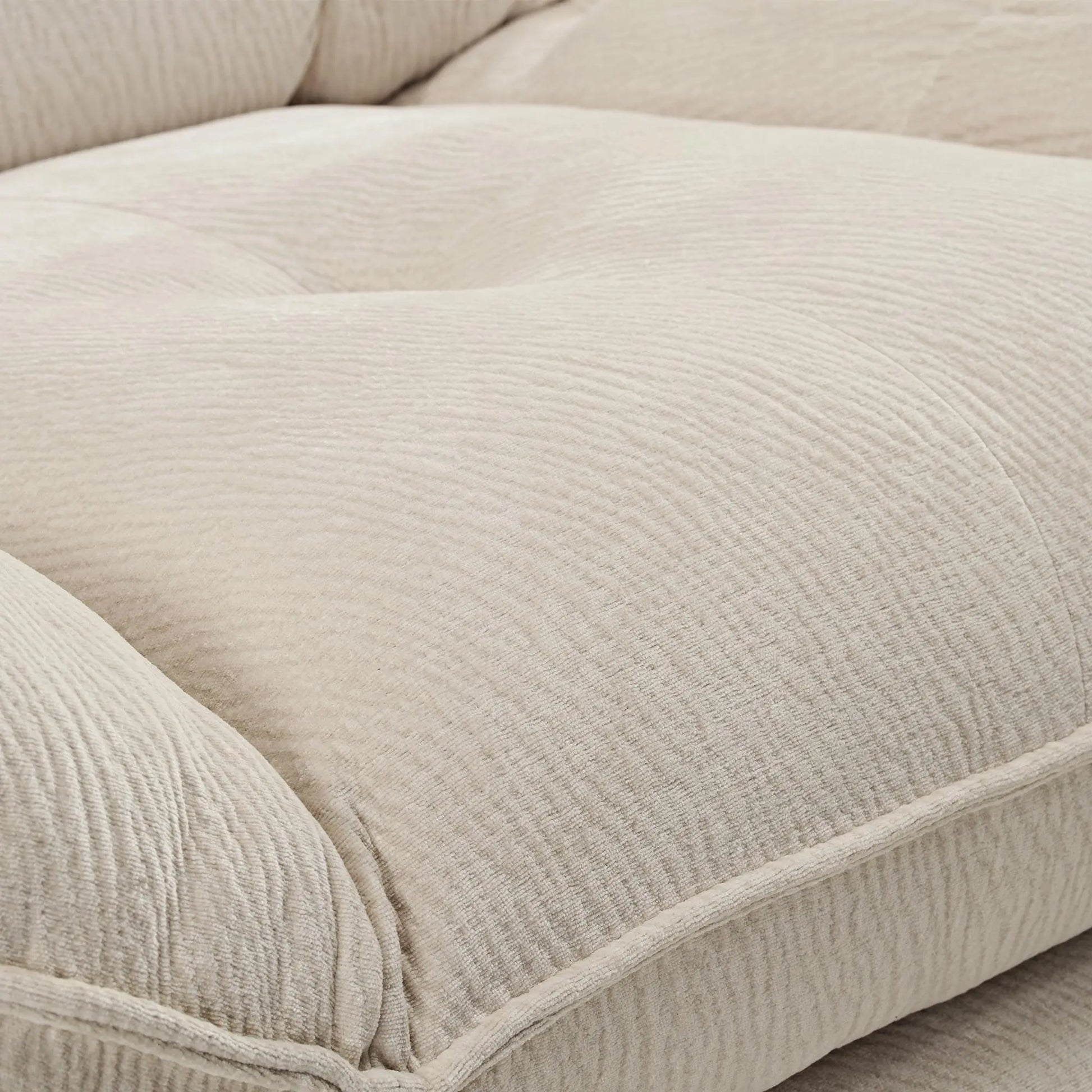 Grayson Recliner Chair Detail, Beige Chenille Fabric, Comfortable Cushions.
