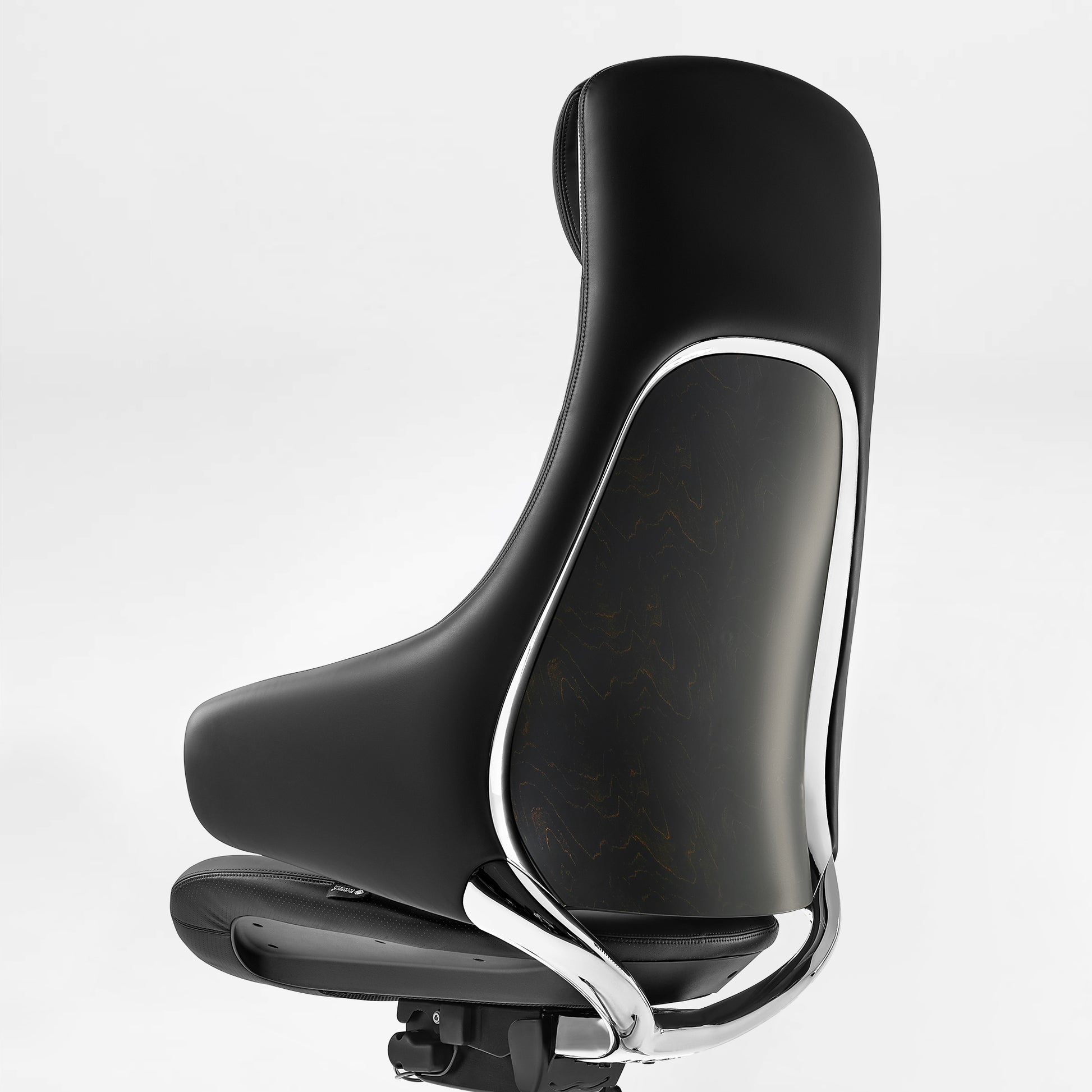 Eureka Ergonomic Serene Ella executive chair: black Napa leather, chrome frame, dark wood grain panel detail, visible stitching.
