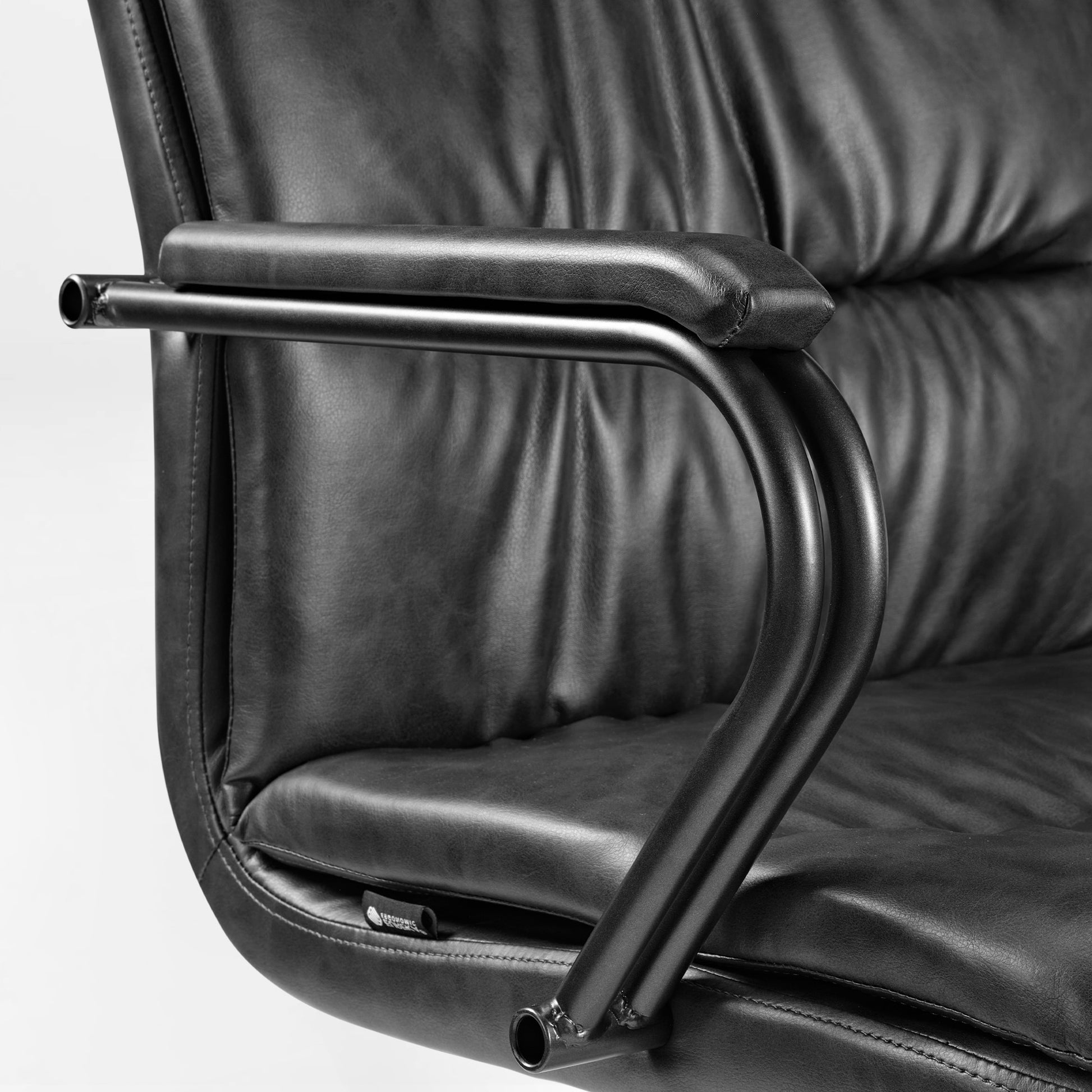 Regal Pu Leather Home Office Chair, Black Armrest Detail, Ergonomic Mid-Century Design.
