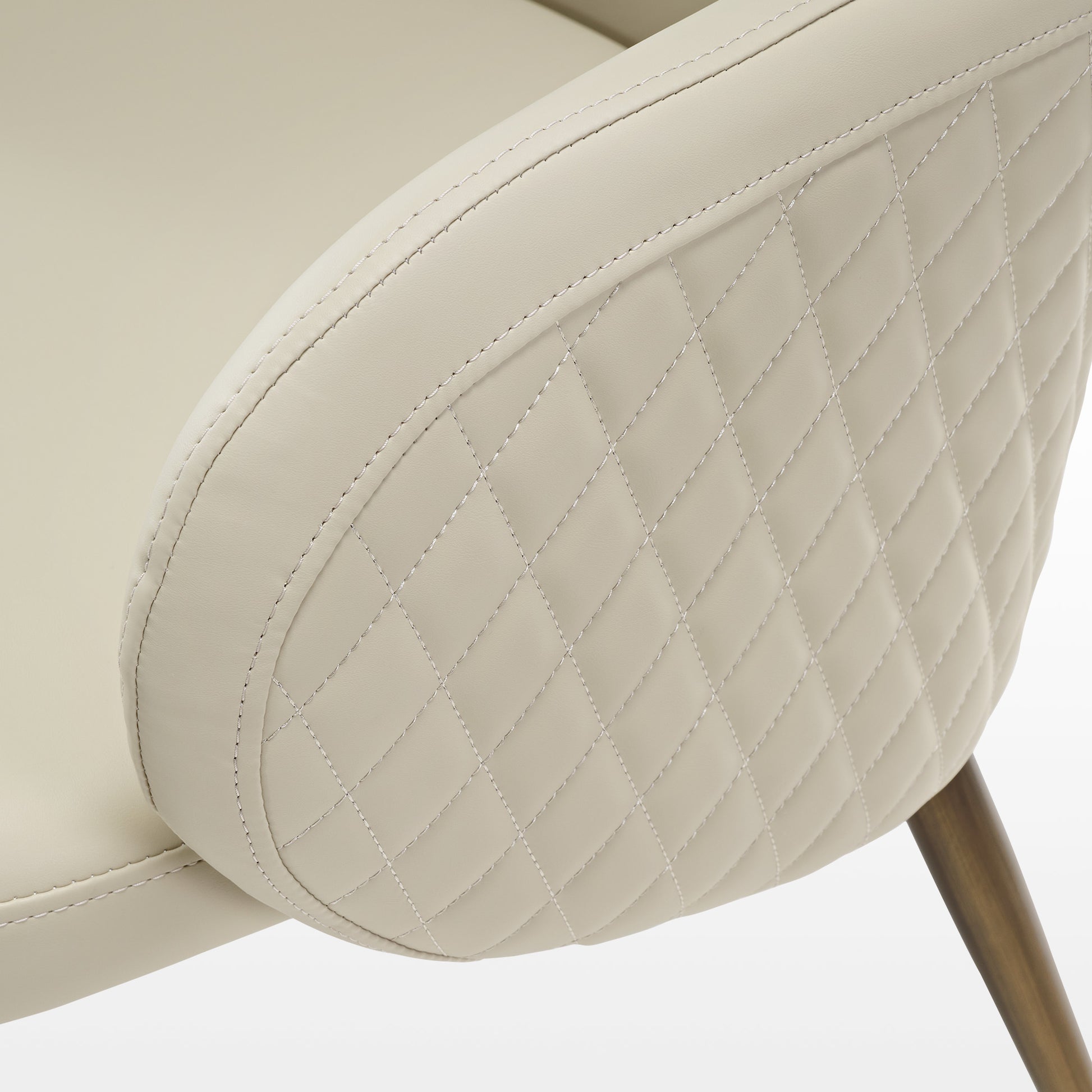 Acalay Beige Dining Armchair Detail, Featuring Diamond-Stitched Backrest and Wooden-Toned Legs.
