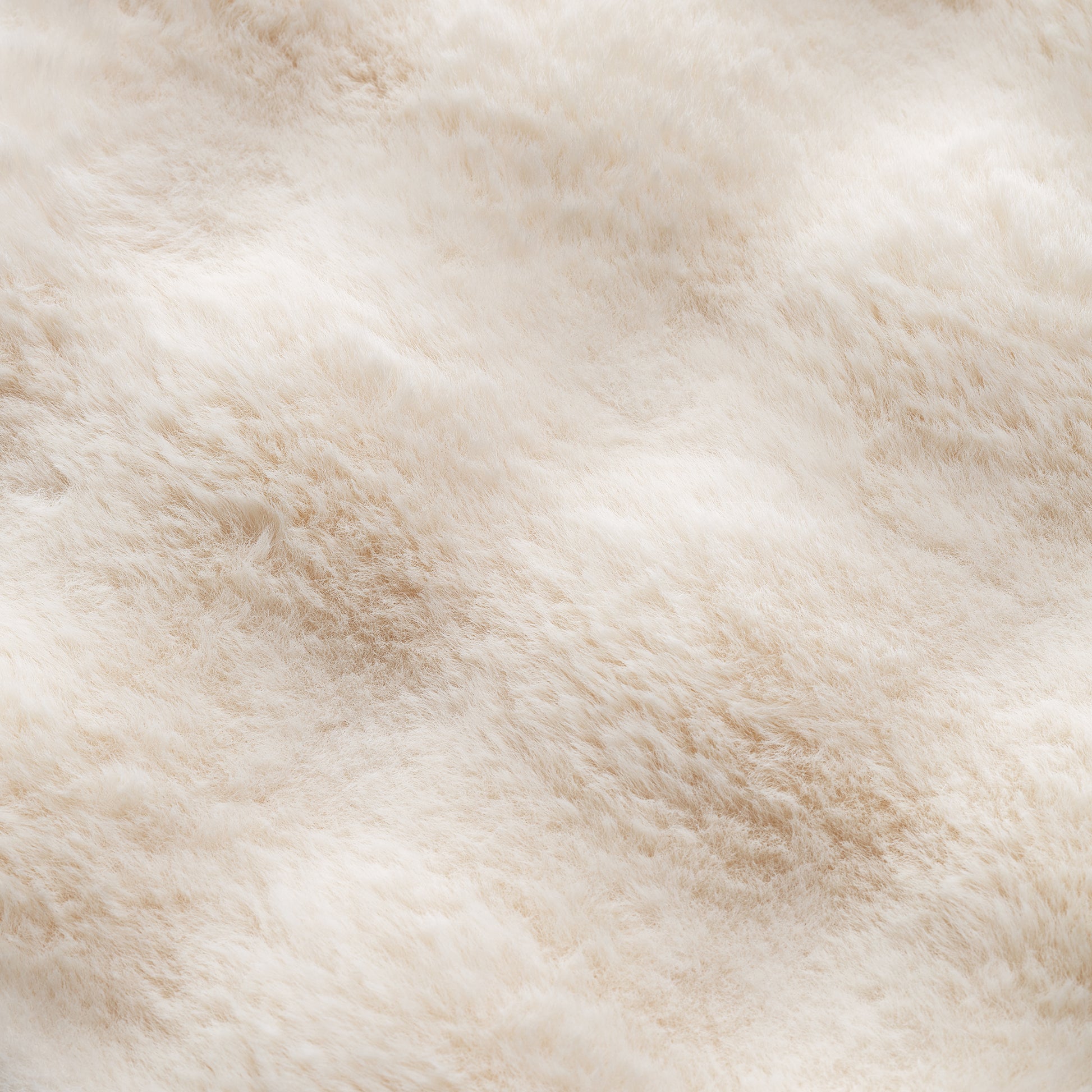 Close-Up of Soft, Plush Cat Bed Cushions in a Light Beige Color, Showcasing Texture and Comfort for Pets.