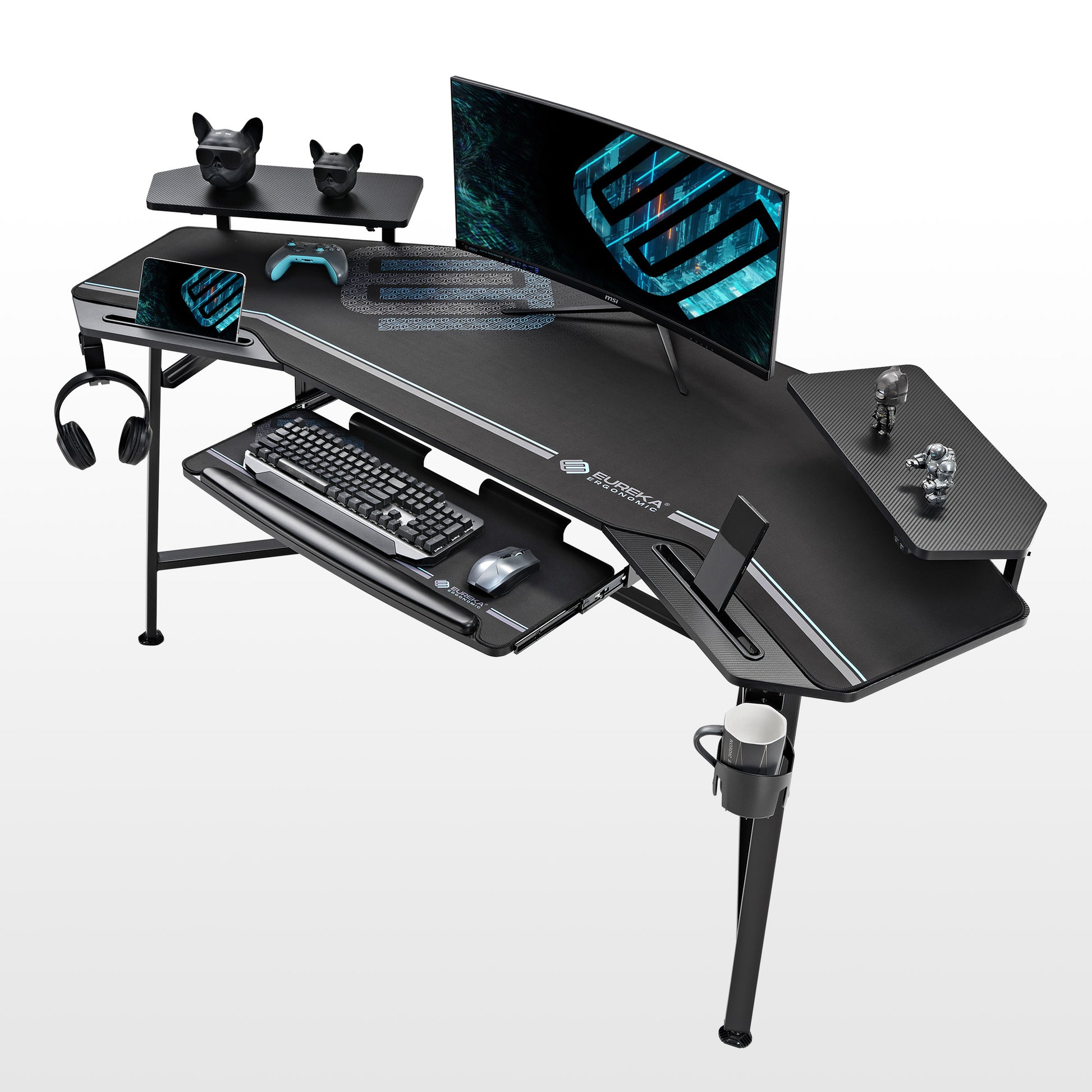 Eureka Ergonomic Black wing-shaped gaming desk with RGB risers, keyboard tray, and accessories for a complete setup.