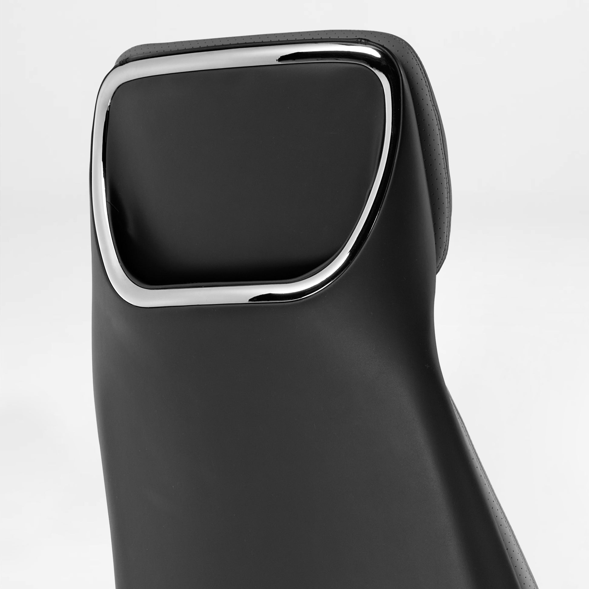 Eureka Ergonomic Serene executive chair headrest: black smooth and perforated Napa leather with polished chrome trim accent.