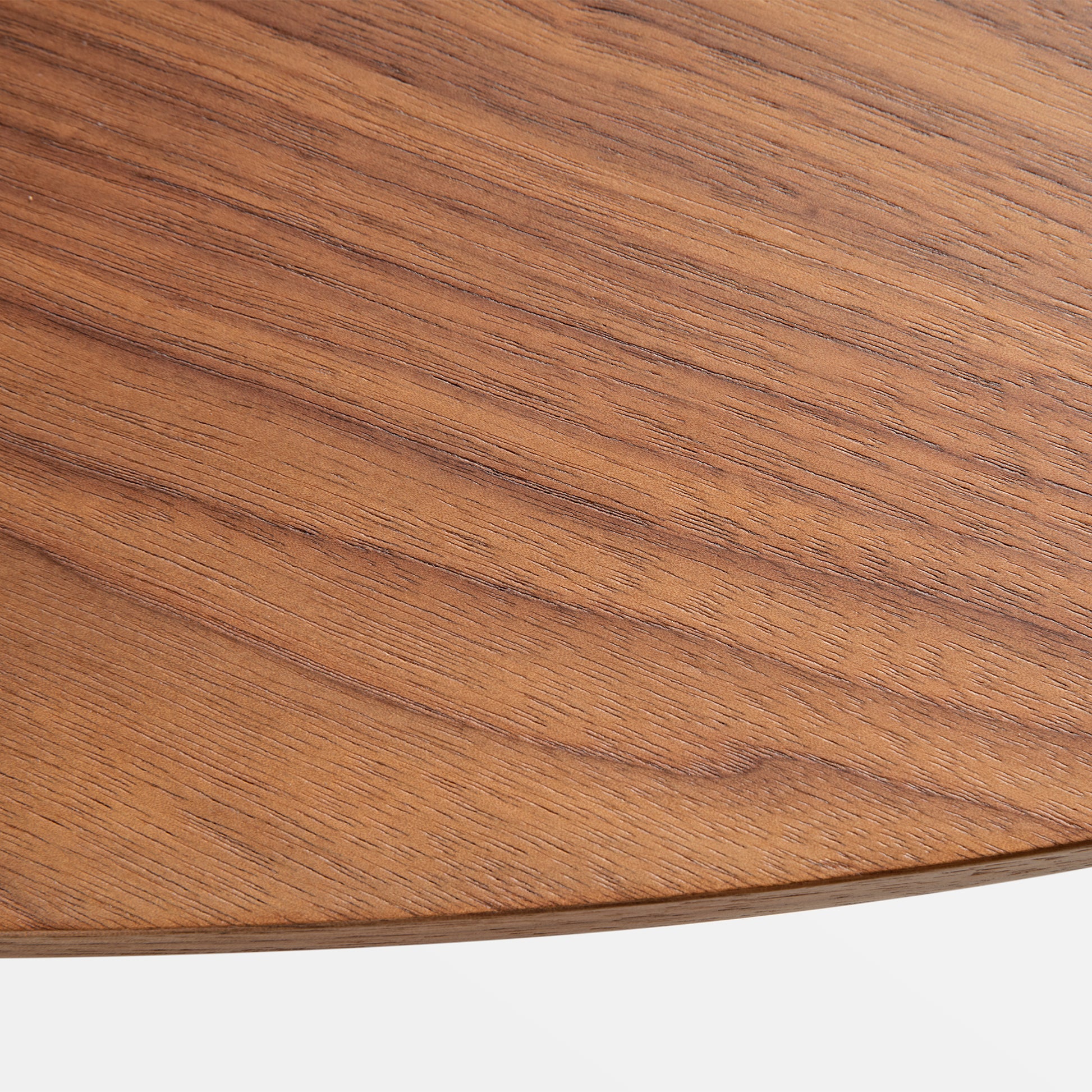 Close-Up of 51 Walnut Oval Coffee Table's Walnut Veneer Tabletop, Showcasing Wood Grain and Edge.
