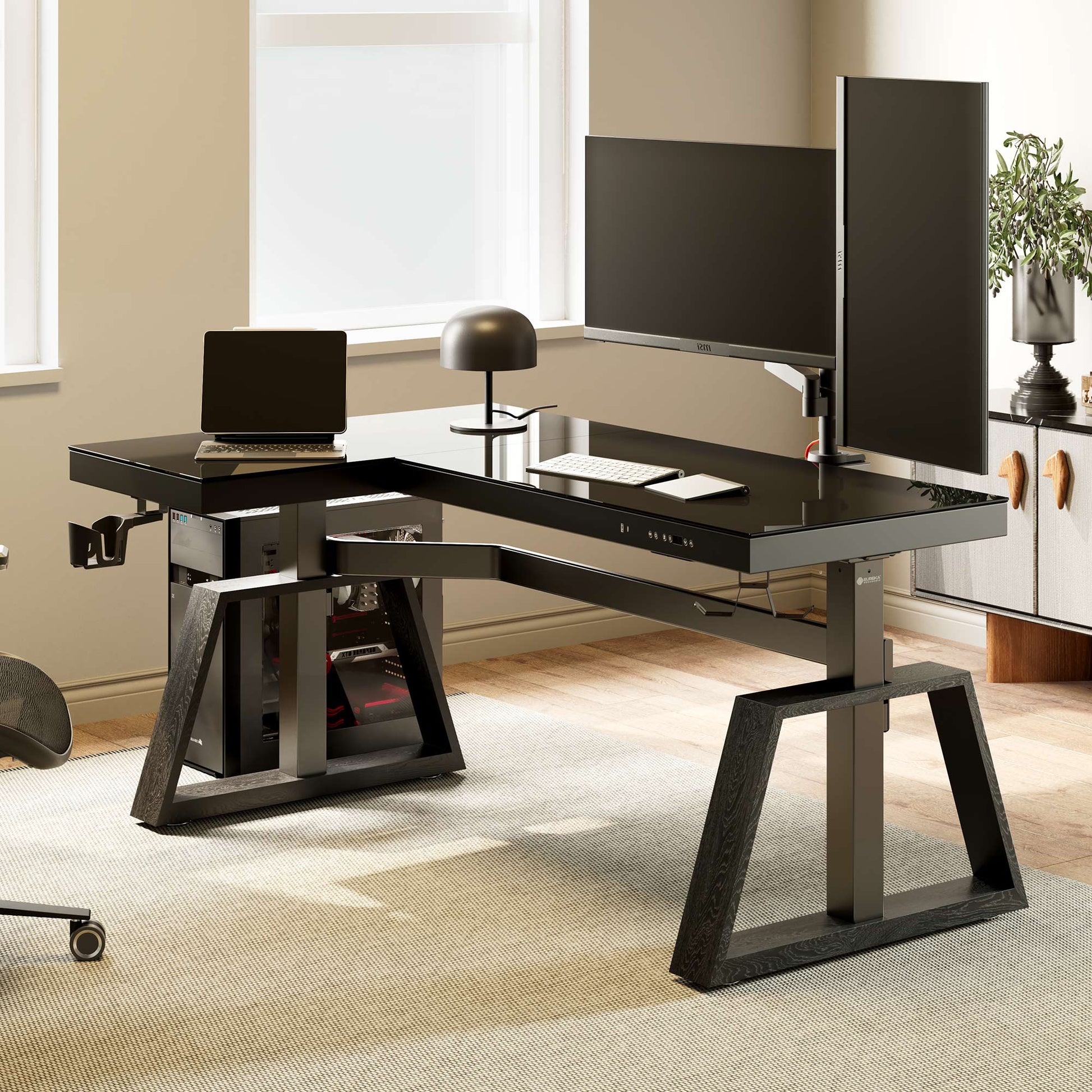 Black L-Shaped GTG-L60 Pro Glass Gaming Desk With Dual Curved Monitors, Laptop, and Pc Setup.