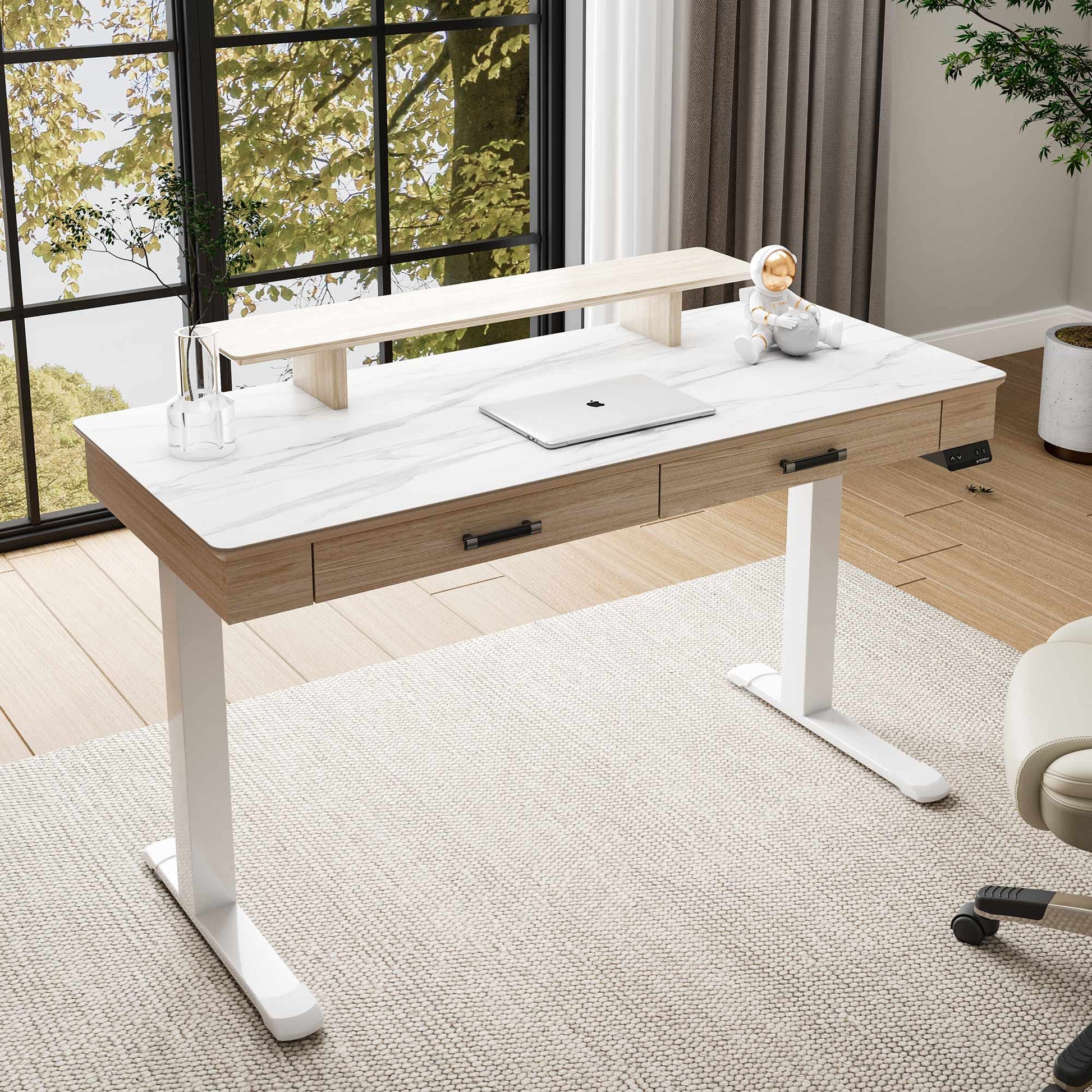 Eureka Ergonomic George Slate Standing Desk in Modern Home Office Setup With White Marble Desktop, Drawers, and Monitor Stand.