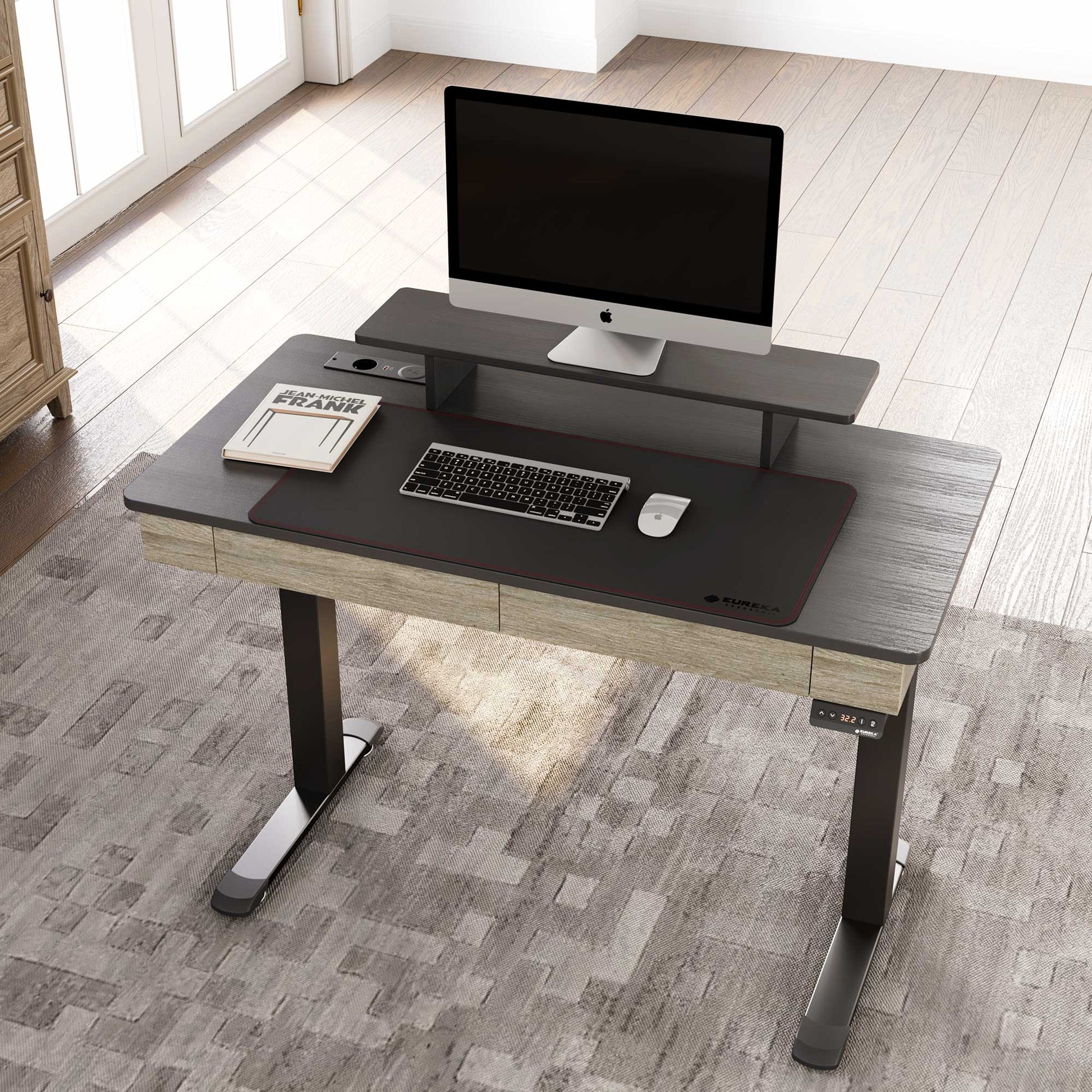 Eureka Ergonomic 47 Standing Desk With Drawers, Black Top and Wood Finish, Complete With Monitor, Keyboard, and Mouse.