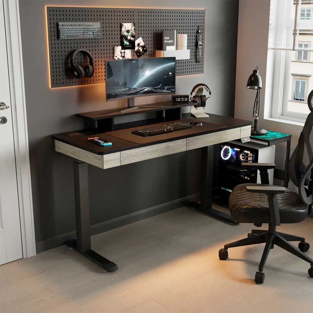 Ergonomic Home Office Setup With a 47 Electric Standing Desk, Monitor, Keyboard, and Gaming Pc, Wood Finish.