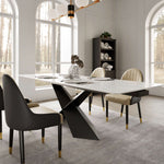 Evelyn Extendable Dining Table With White Sintered Stone Surface and Modern Black X-Shaped Legs, Seating Up to 8 Guests.