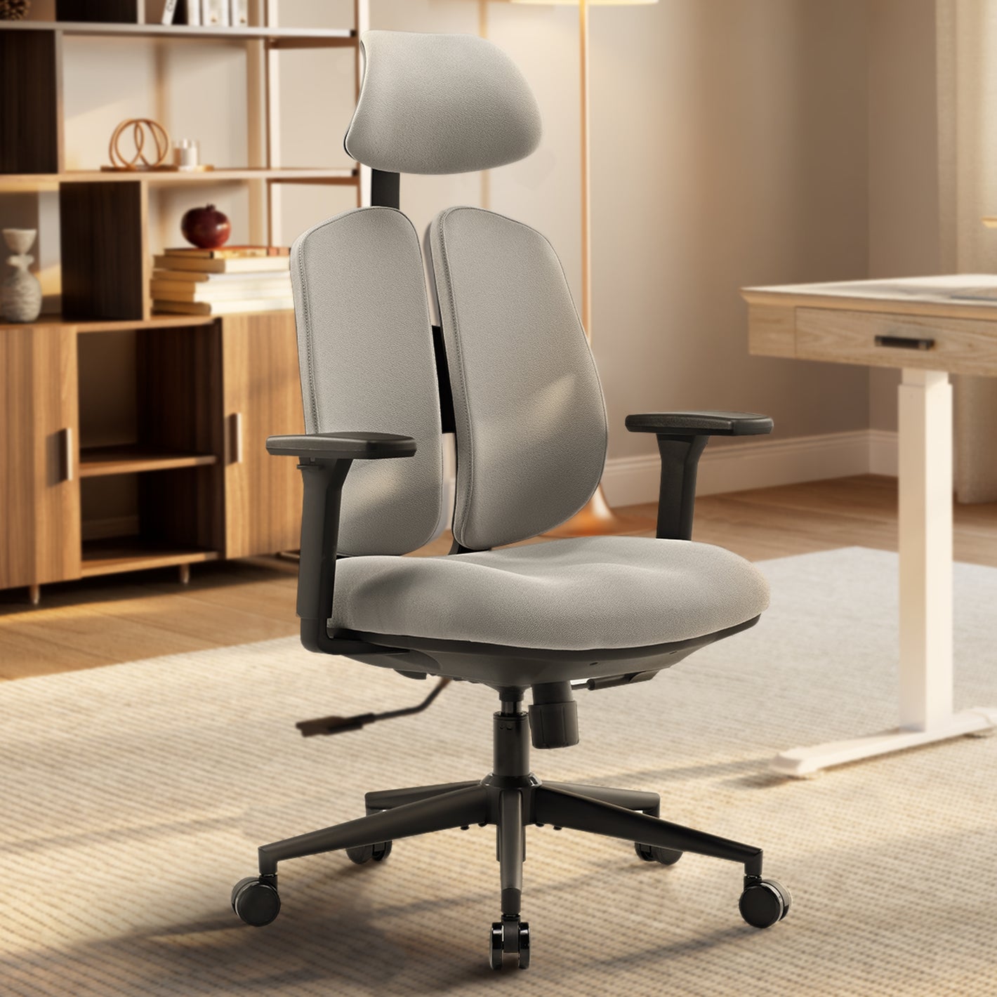 Flex Ergonomic Office Chair With Dual Backrests, Gray Fabric, and Black Base, Promoting Comfortable Posture.