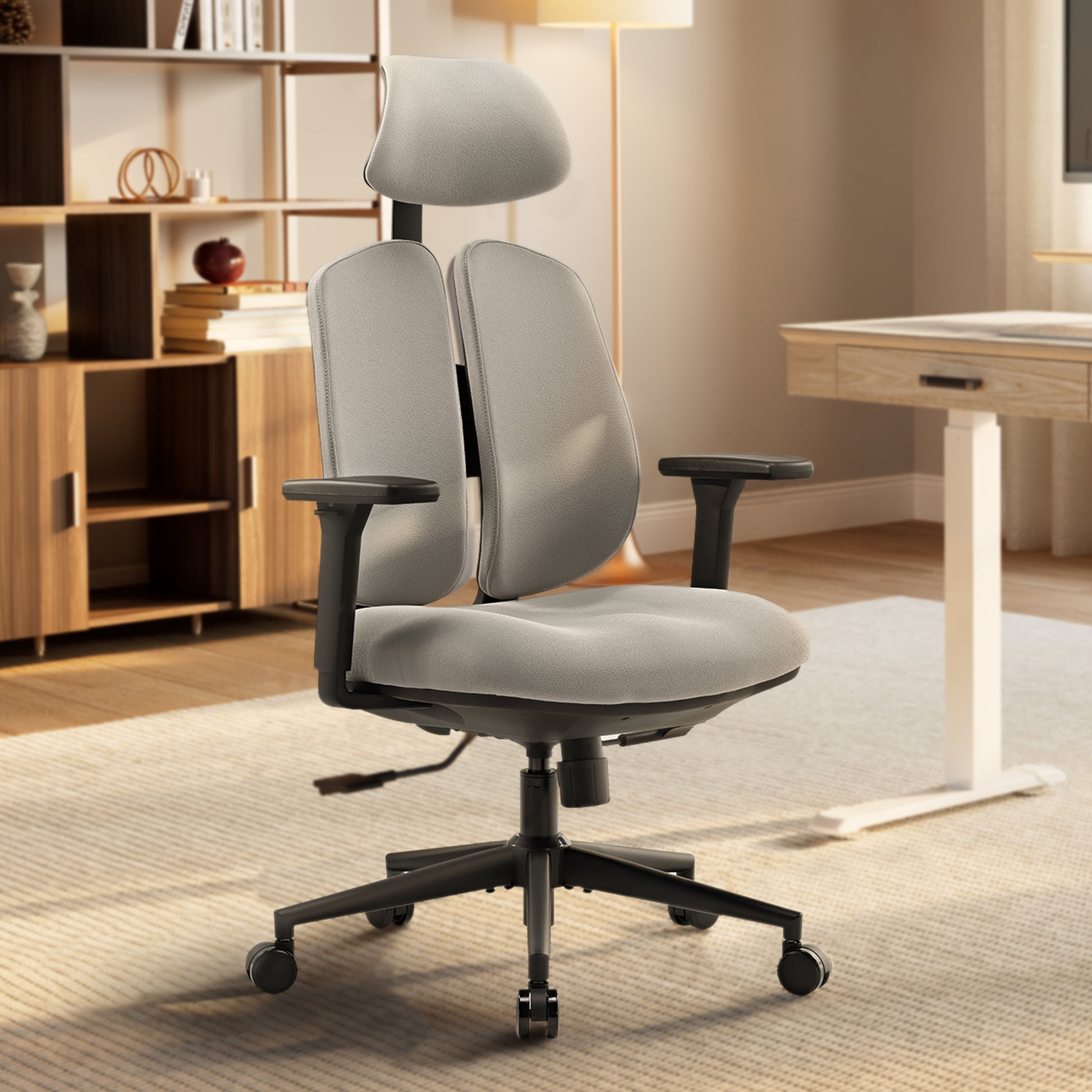 Flex Ergonomic Office Chair With Dual Backrests, Gray Fabric, and Black Base, Promoting Comfortable Posture.