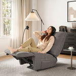 Woman Relaxing in Gray Techno 3D Fabric Linx Power Glider Recliner, Modern Living, Wireless Charging.
