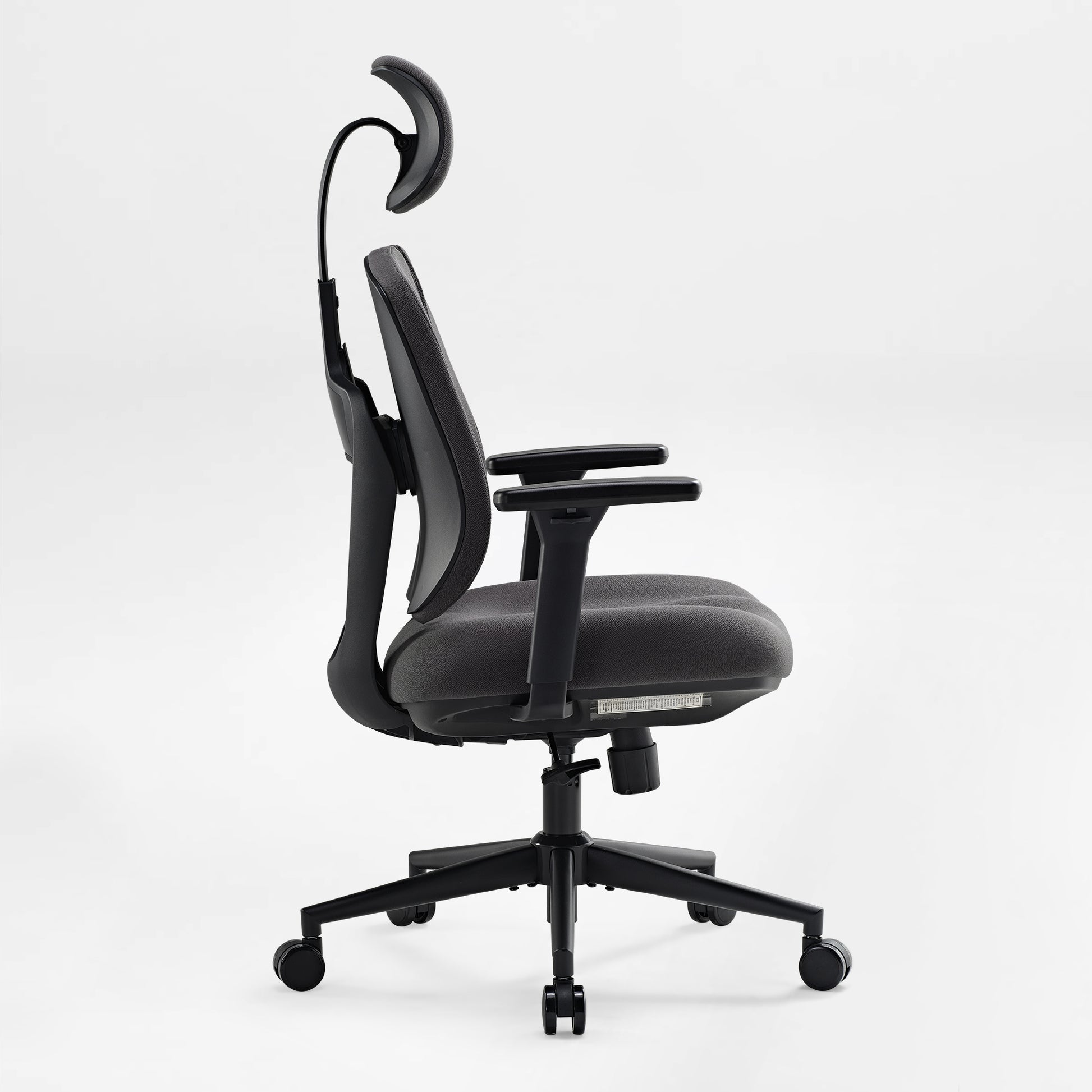 Flex Ergonomic Office Chair With Dual Backrests, Adjustable Headrest and Armrests, in Gray Fabric and Black Frame.