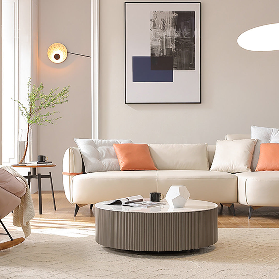 Modern Living Room With White Sintered Stone Coffee Table Set and Beige Sofa, Showcasing Modern Design.
