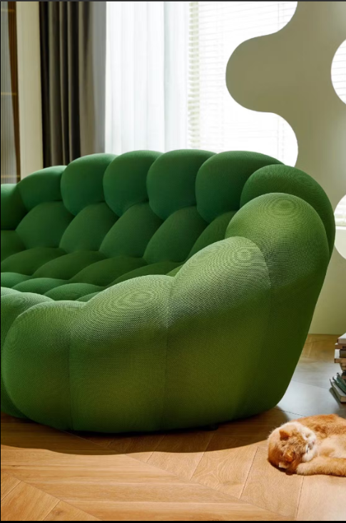 Luca Modern Green 3-Seater Sofa. Bubble Design Green Sofa in Modern Living Room With Cat.
