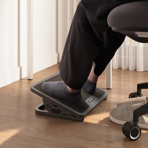 Under-desk foot support for an office chair that sits high enough for the keyboard and monitor.