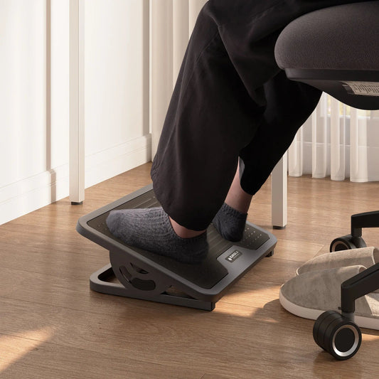 Under-desk foot support for an office chair that sits high enough for the keyboard and monitor.