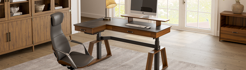 An ergonomic chair paired with a height-adjustable L-shaped desk creates a harmonious home study setup.