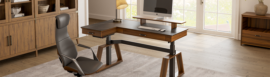 An ergonomic chair paired with a height-adjustable L-shaped desk creates a harmonious home study setup.