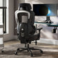 Typhon II Hybrid Ergonomic Gaming Chair in a modern office setting with a computer desk and monitor, black