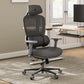 Gray office chair in a home office setting with a desk and computer monitor.