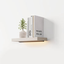 Eureka Ergonomic Floating Wall Shelf With Lighting, Books, and Decor.
