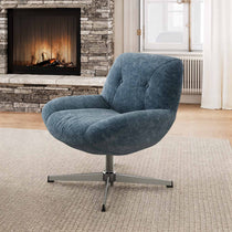 Eureka Ergonomic Henry Chenille Swivel Lounge Chair in Blue, With 360° Rotation, in Front of Fireplace.