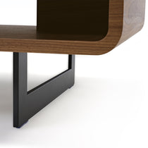 Eureka Ergonomic 47 Walnut Coffee Table Detail: Curved Edge, Wood Grain, and Black Leg.