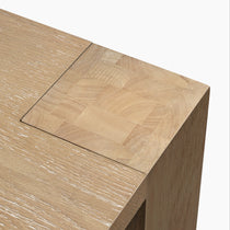 Close-Up of Edora Oak Extendable Dining Table Corner, Showing Oak Veneer Wood Grain Detail and Extendable Leaf Seam.